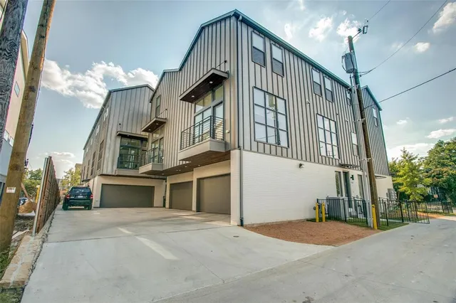 a front view of a house with a garage