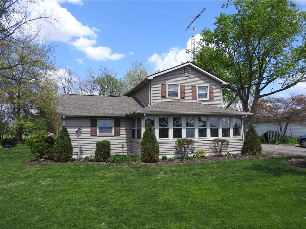 2185 East Loy Road Piqua, OH 45356 - Photo 2 of 19 This charming residence offers comfortable living spaces and a welcoming exterior.