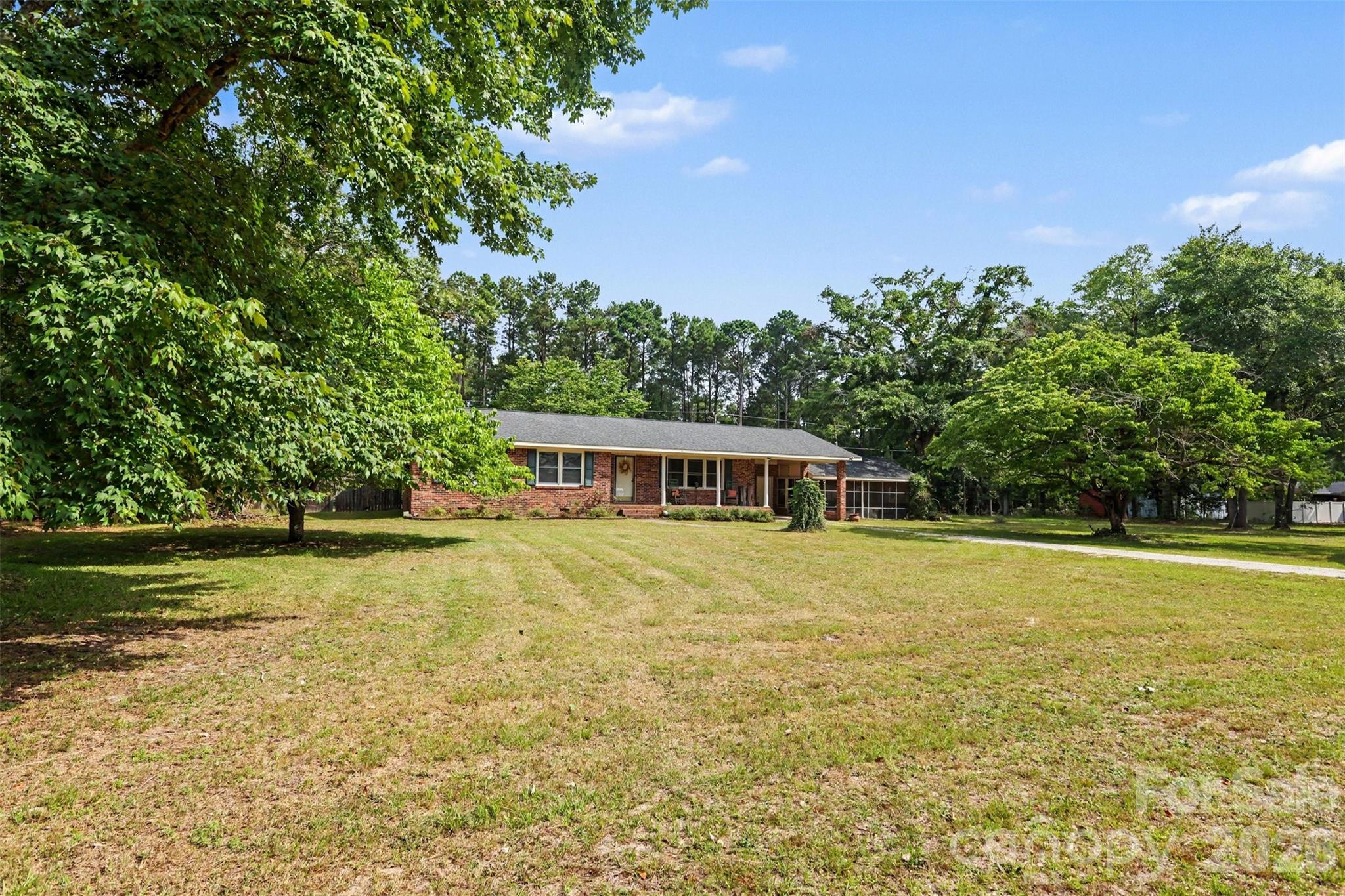 6774 Woodhaven Road Kershaw, SC 29067 - Photo 2 of 30 a view of a house with a yard