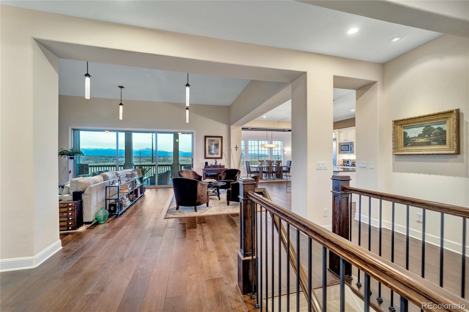 15653 Deer Mountain Circle Broomfield, CO 80023 - Photo 12 of 37 a view of a living room and dining room