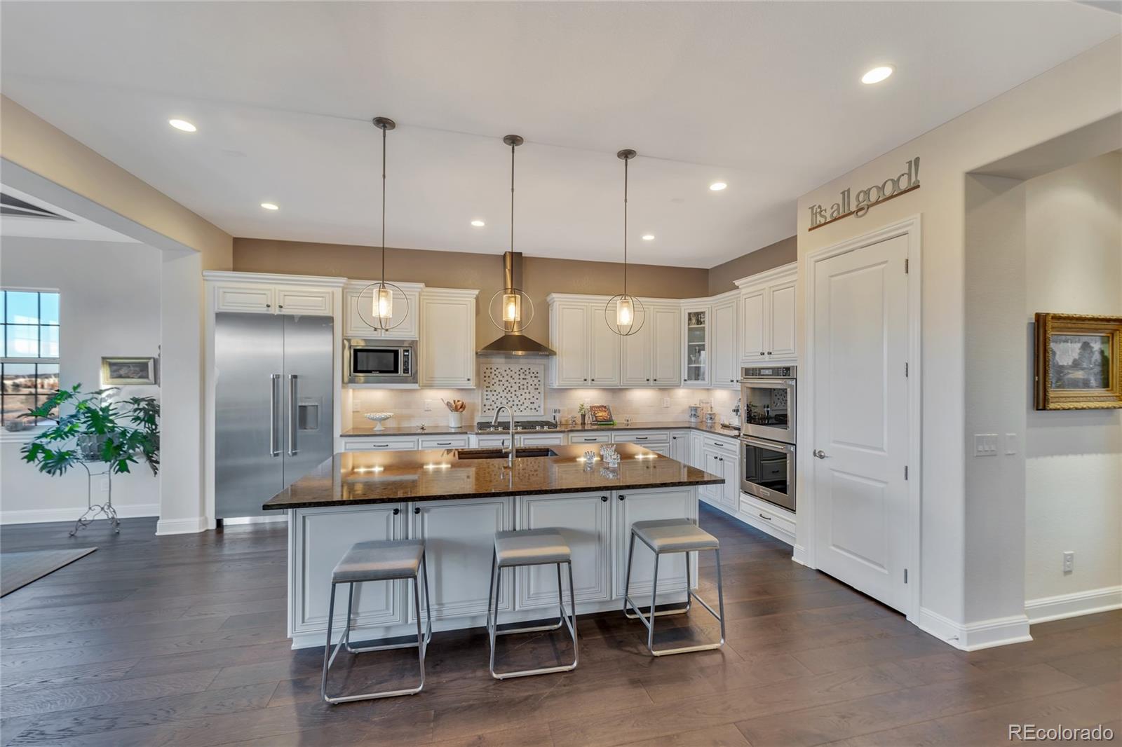 15653 Deer Mountain Circle Broomfield, CO 80023 - Photo 18 of 37 a kitchen with counter space and appliances