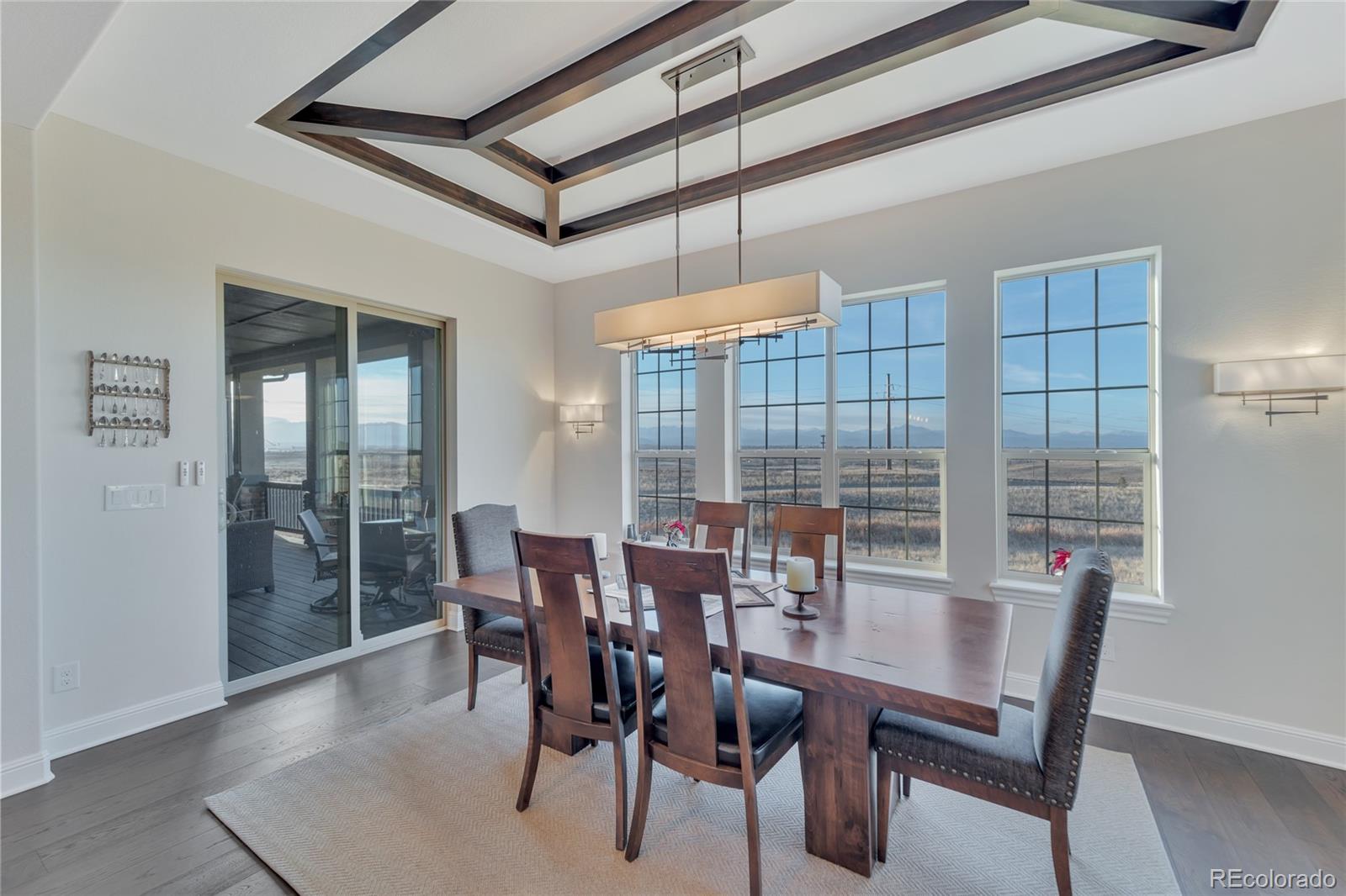 15653 Deer Mountain Circle Broomfield, CO 80023 - Photo 21 of 37 a view of a dining room with furniture