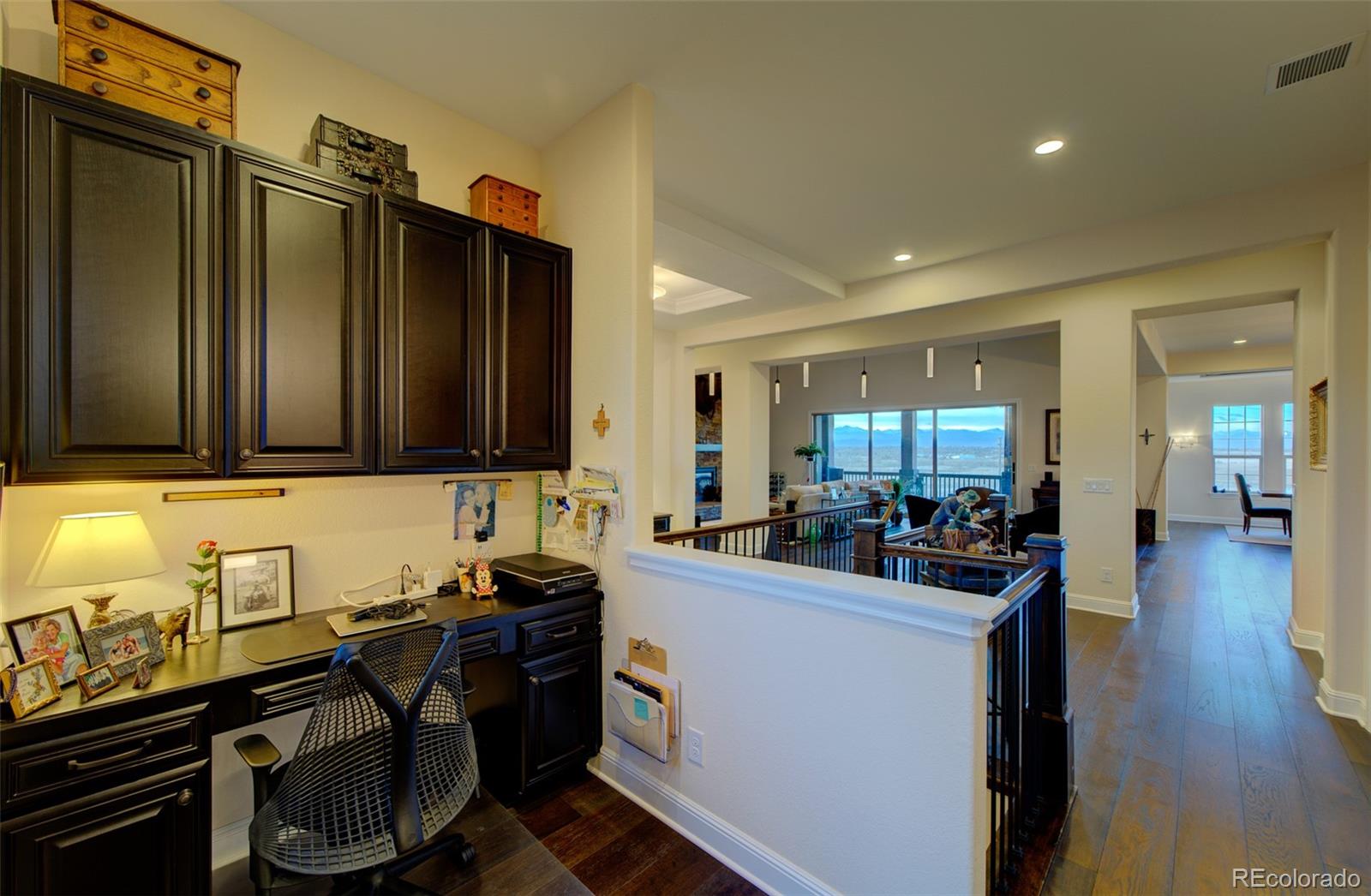 15653 Deer Mountain Circle Broomfield, CO 80023 - Photo 27 of 37 a kitchen with sink cabinets and appliances