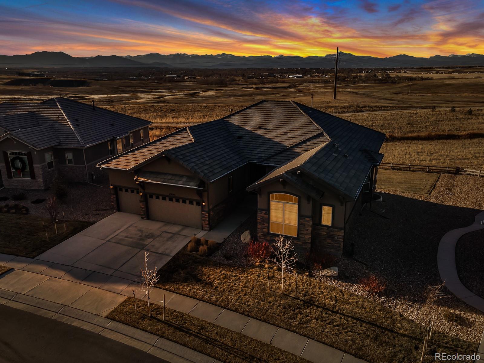 15653 Deer Mountain Circle Broomfield, CO 80023 - Photo 3 of 37 a view of a terrace with sky view