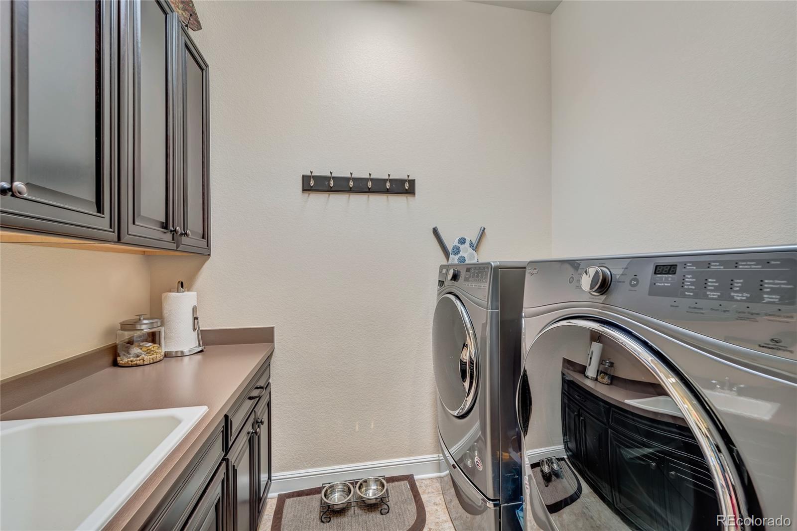 15653 Deer Mountain Circle Broomfield, CO 80023 - Photo 31 of 37 a view of a washer and dryer