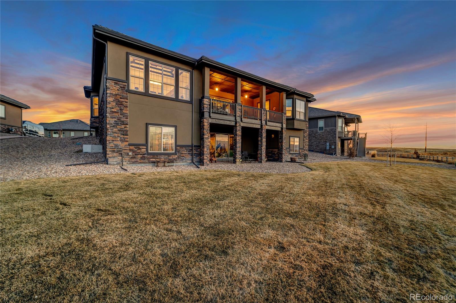 15653 Deer Mountain Circle Broomfield, CO 80023 - Photo 33 of 37 a view of a house with a outdoor space