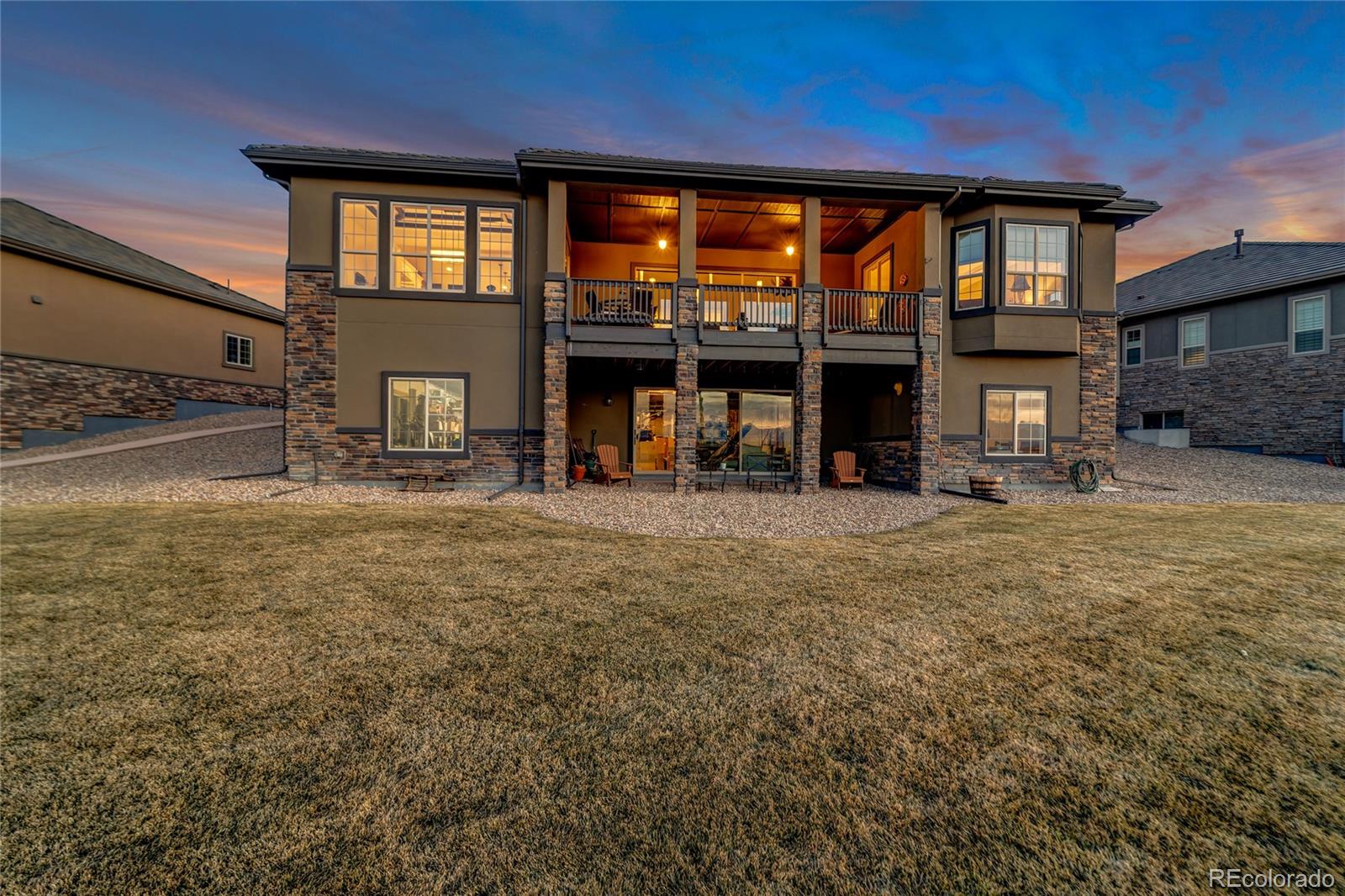 15653 Deer Mountain Circle Broomfield, CO 80023 - Photo 35 of 37 a view of a house with a patio