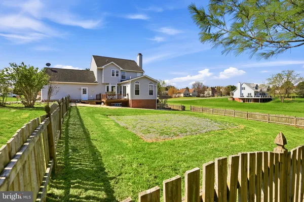 a house view with a garden space
