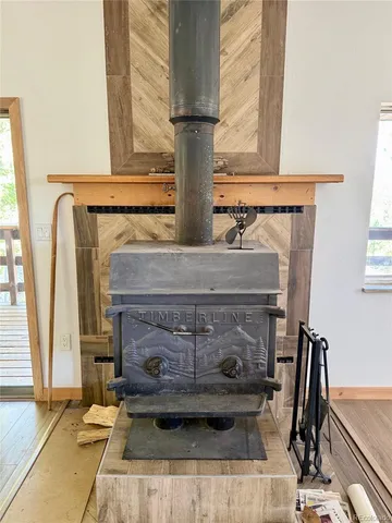 a view of fireplace and living room