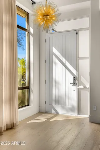 a view of entryway with a front door