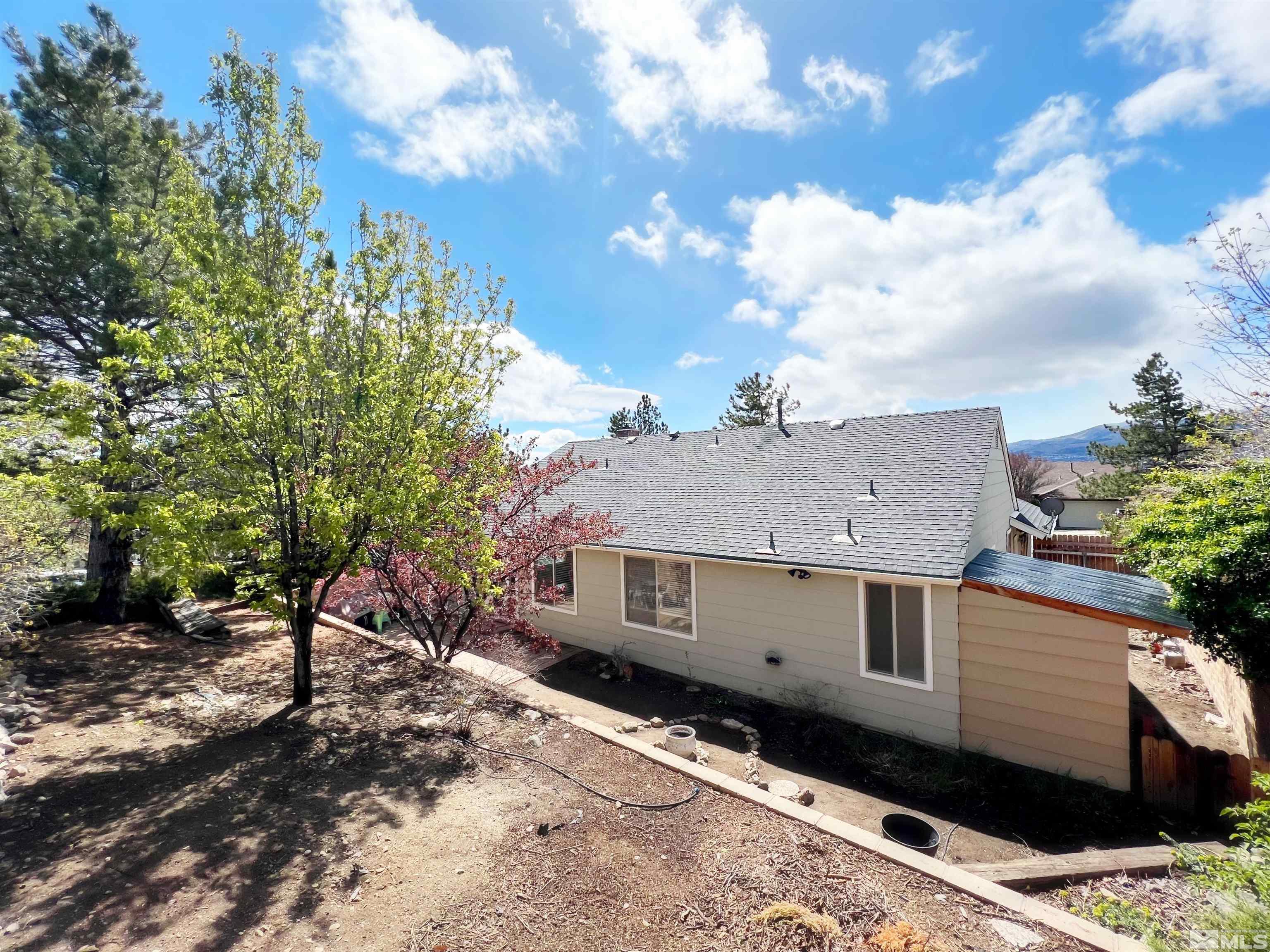 3849 Bexley Square Reno, NV 89503 - Photo 13 of 37 a view of a house with a yard