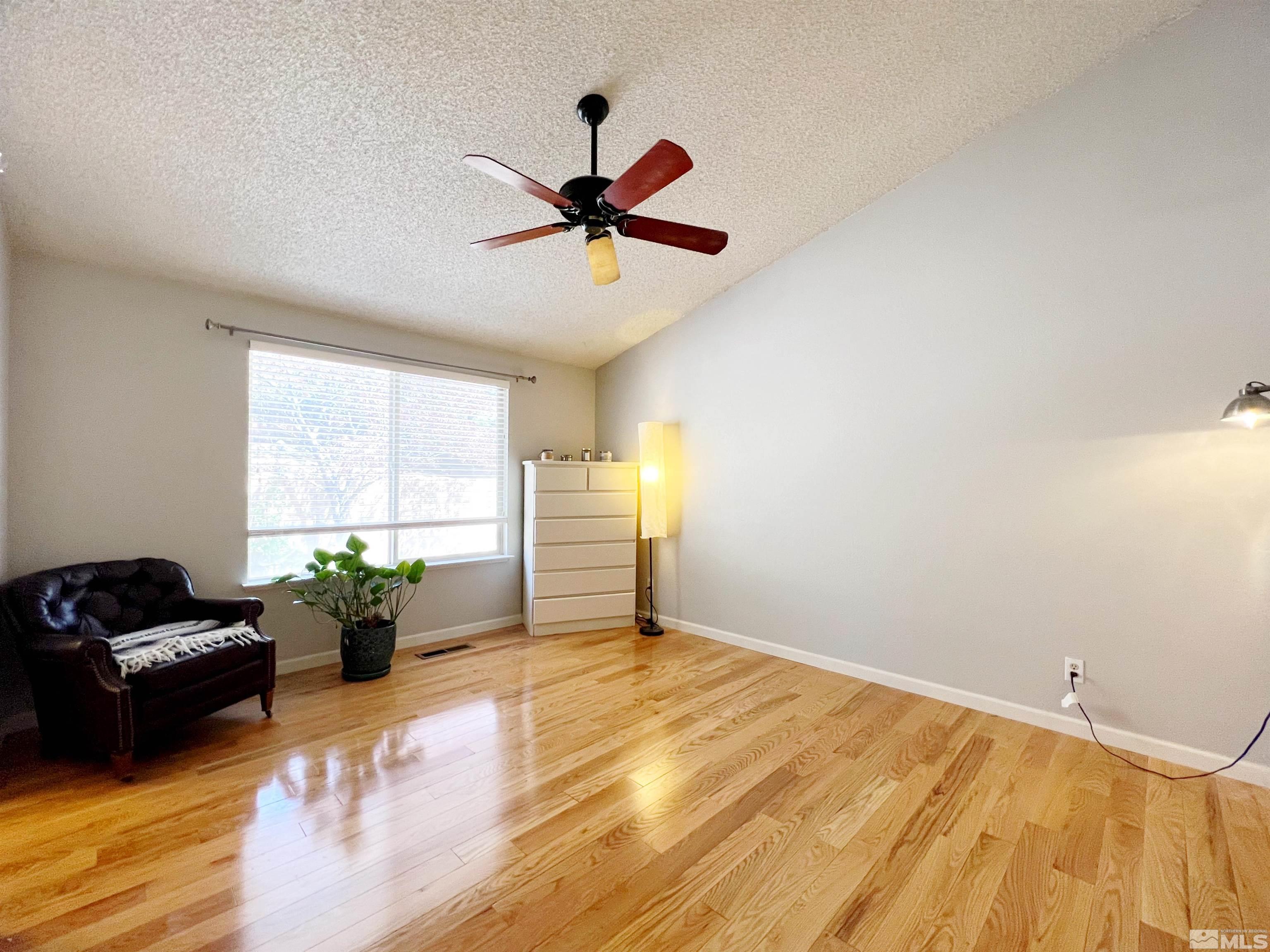 3849 Bexley Square Reno, NV 89503 - Photo 15 of 37 a living room with furniture and a window