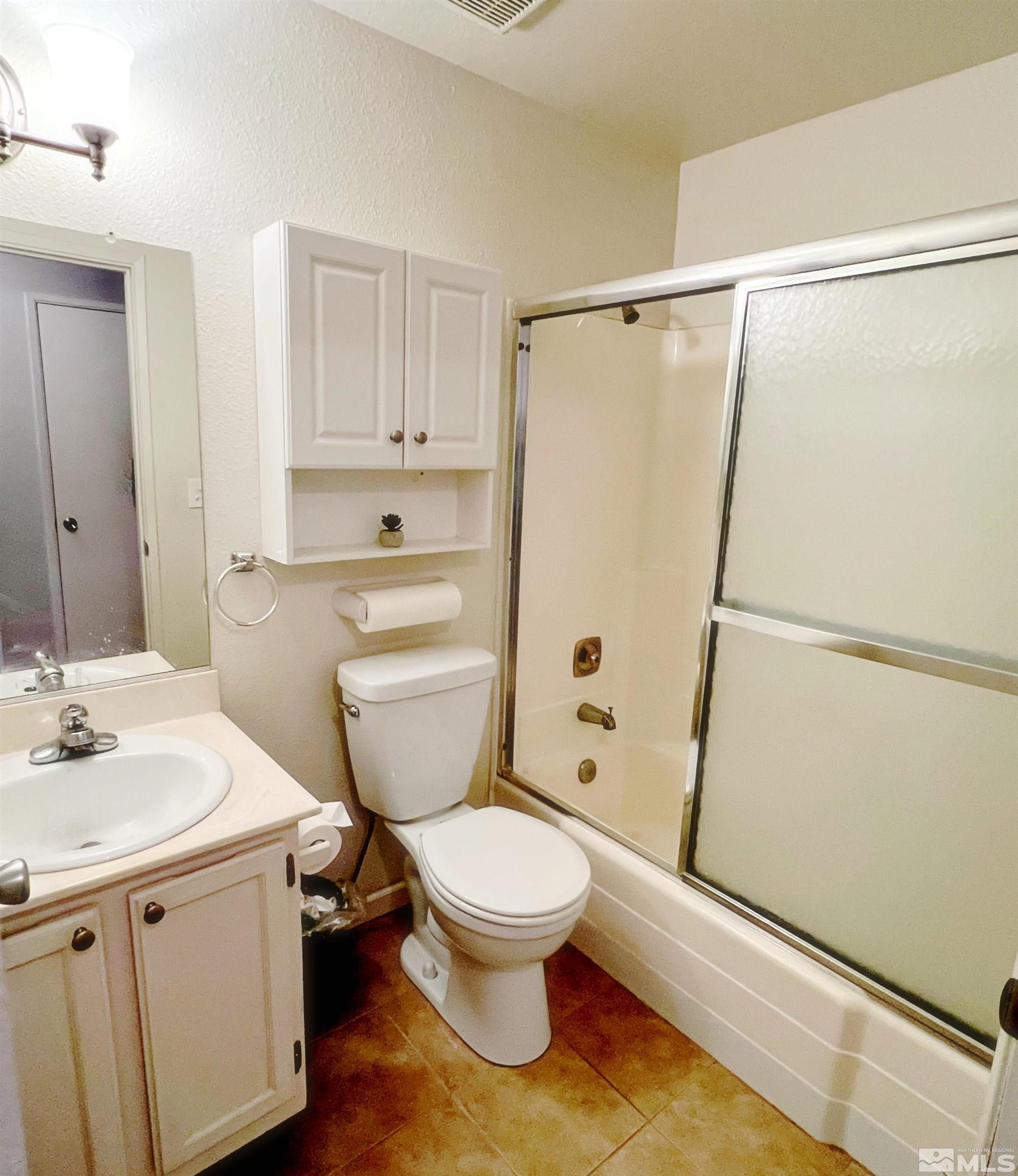 3849 Bexley Square Reno, NV 89503 - Photo 19 of 37 a bathroom with a sink toilet and shower