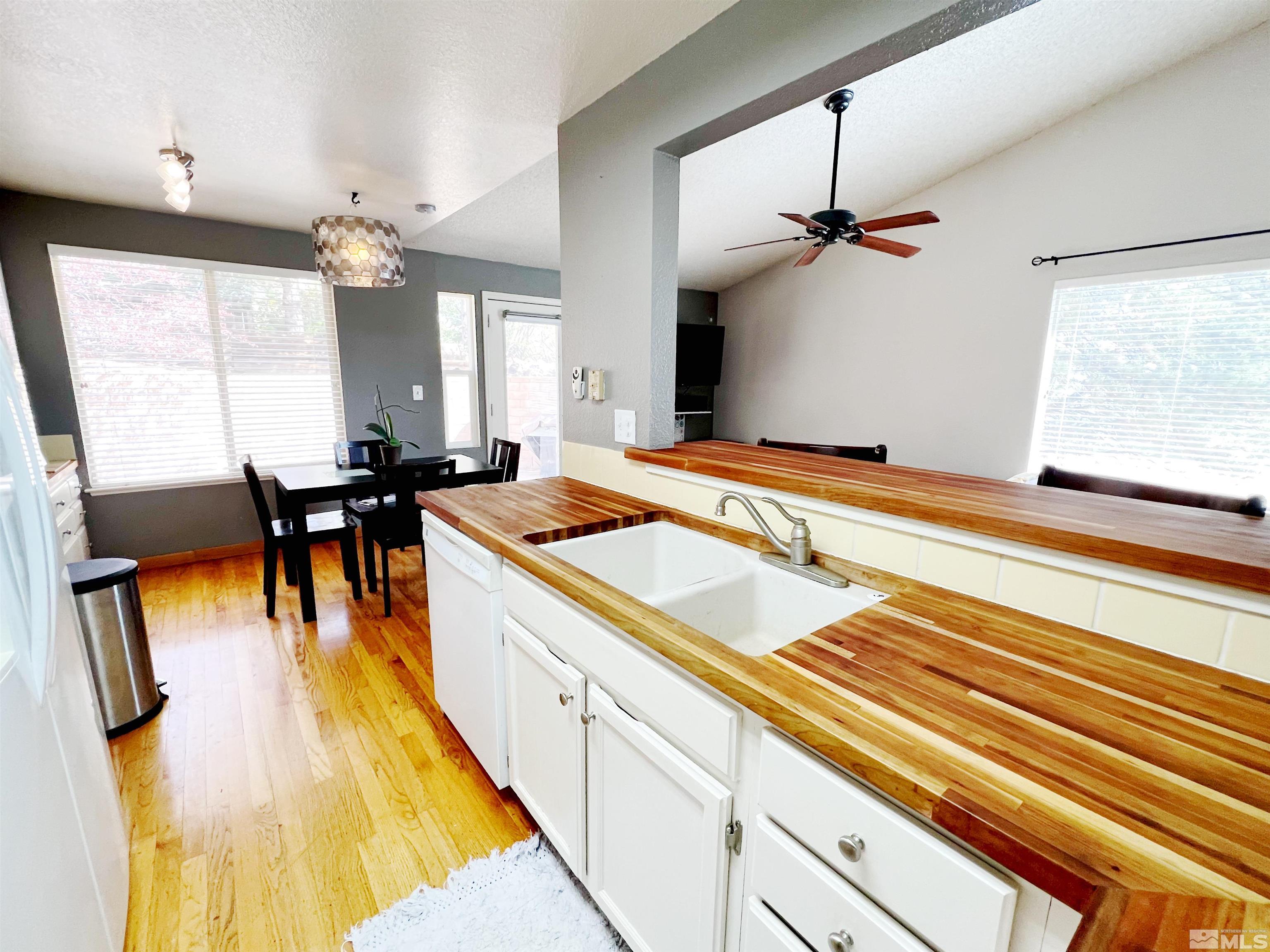 3849 Bexley Square Reno, NV 89503 - Photo 25 of 37 a very nice looking dining room with a large window