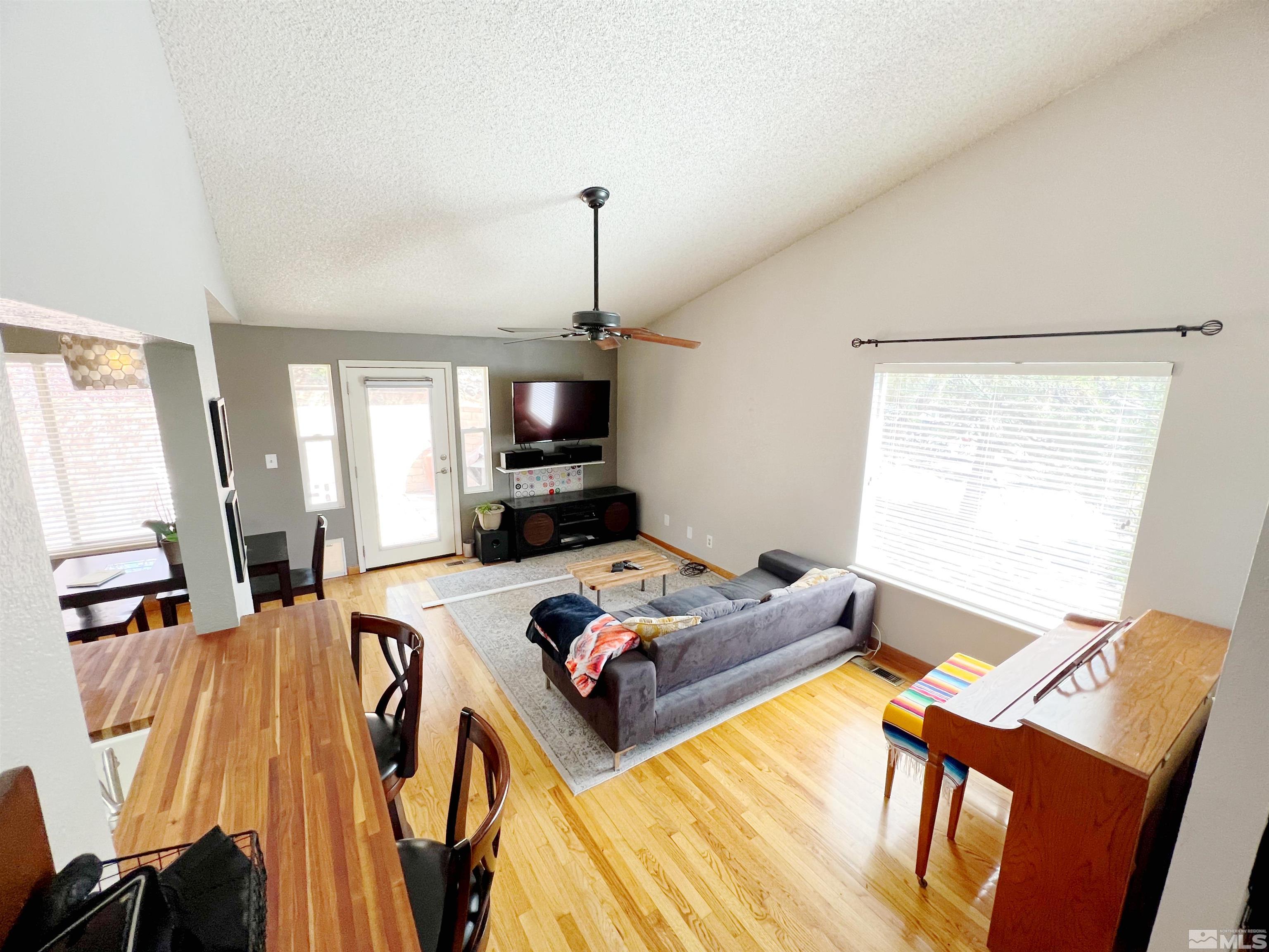 3849 Bexley Square Reno, NV 89503 - Photo 33 of 37 a living room with furniture and a flat screen tv
