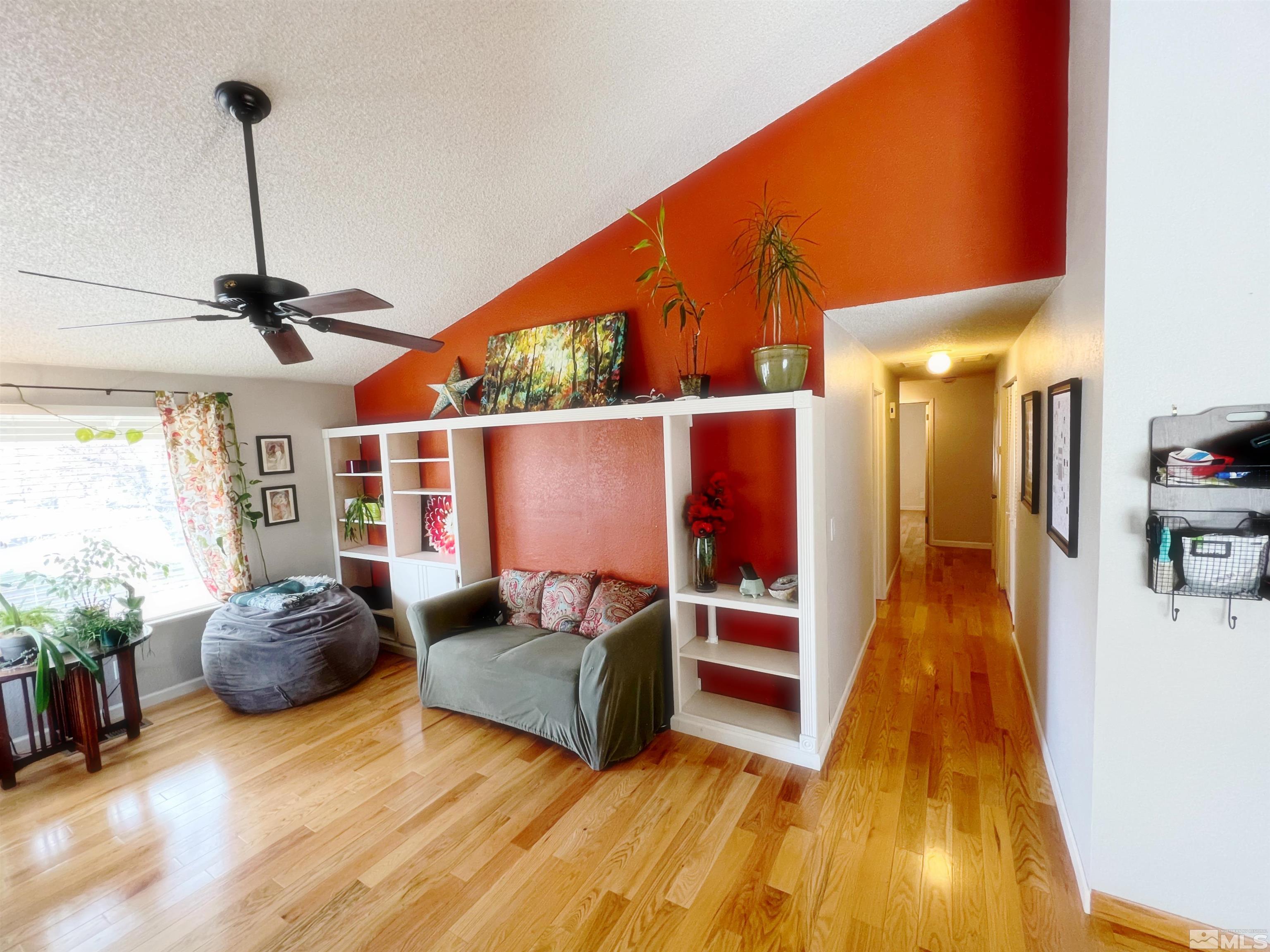 3849 Bexley Square Reno, NV 89503 - Photo 34 of 37 a living room with furniture and a wooden floor