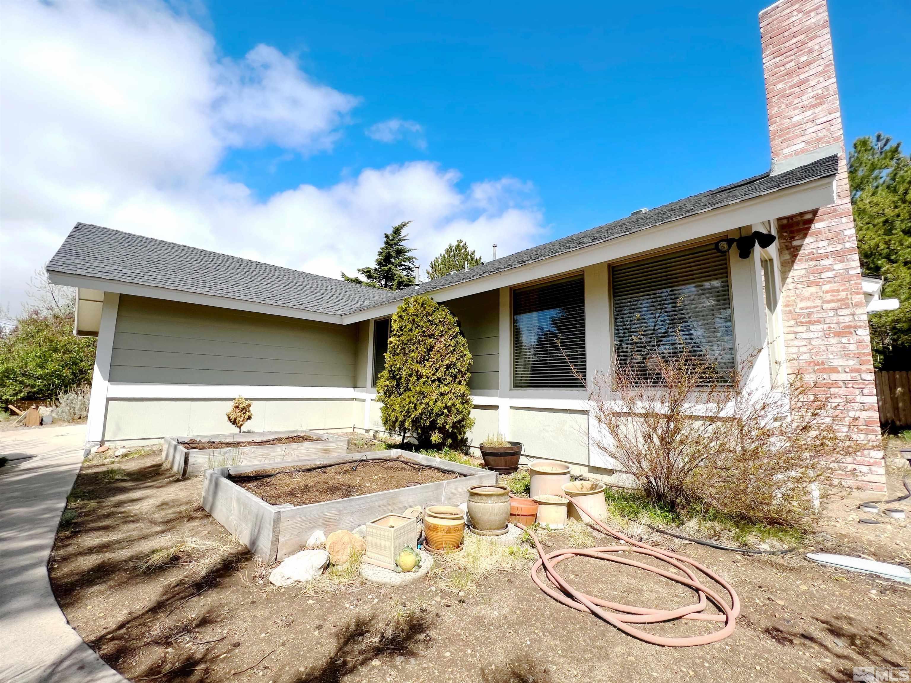 3849 Bexley Square Reno, NV 89503 - Photo 6 of 37 a view of a house with backyard and sitting area
