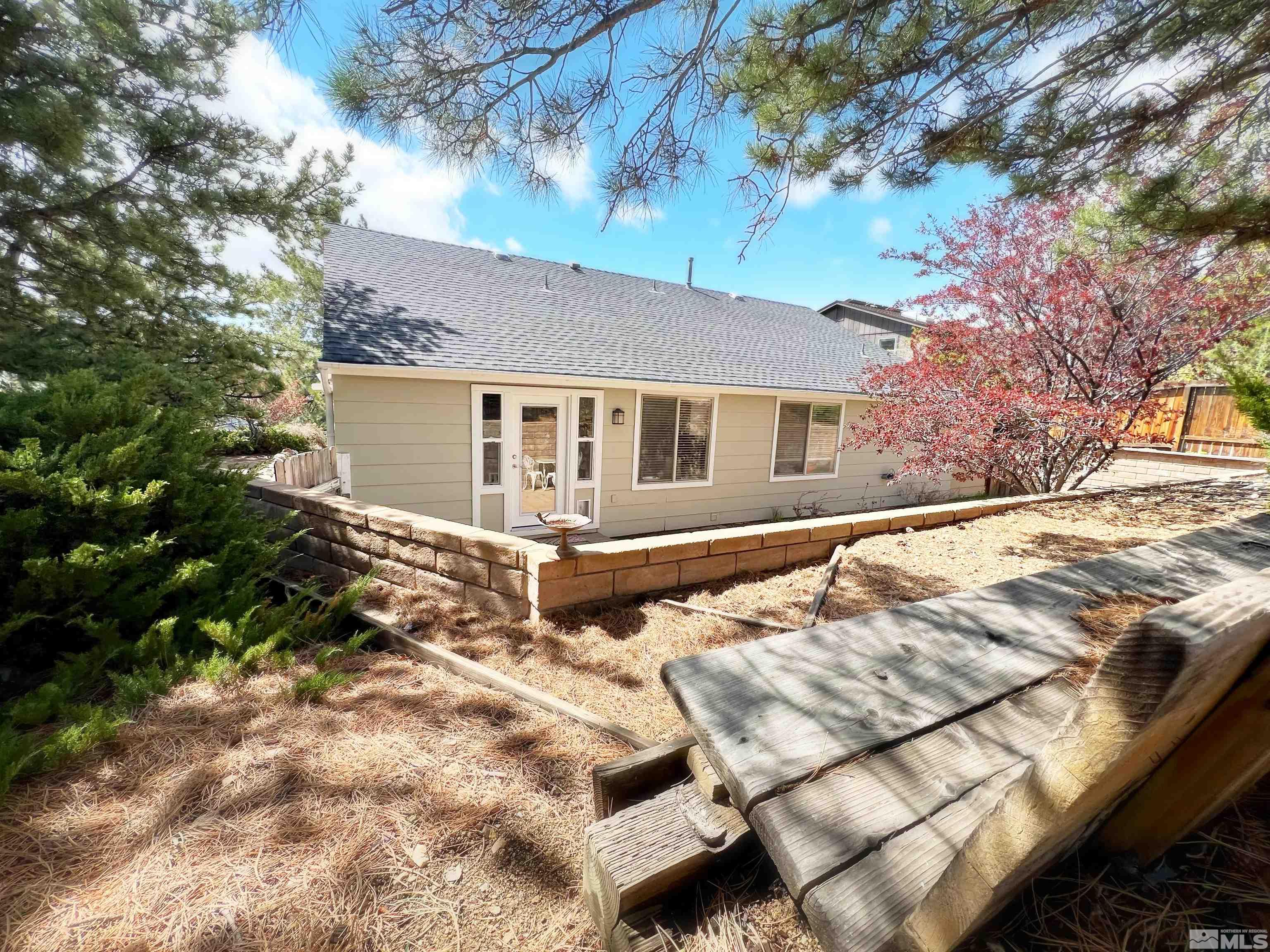 3849 Bexley Square Reno, NV 89503 - Photo 10 of 37 a view of a house with a yard