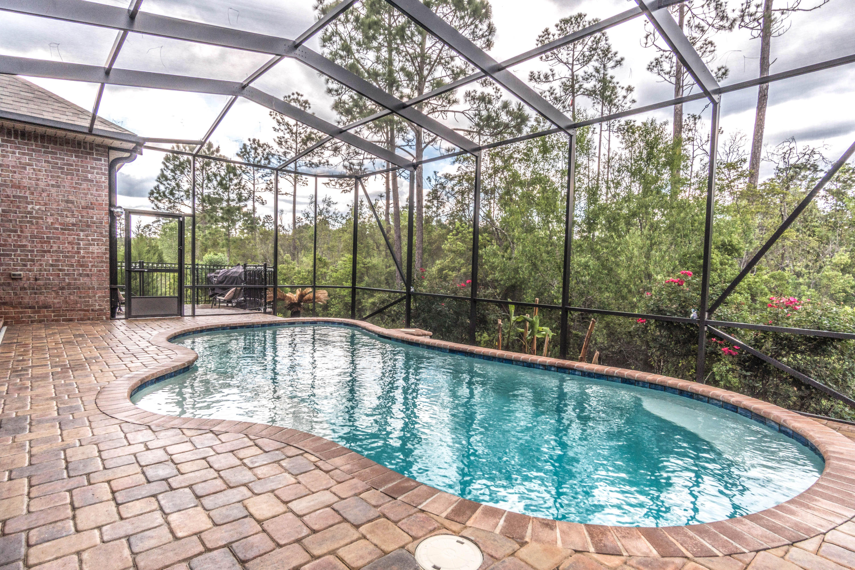 604 Red Fern Road Crestview, FL 32536 - Photo 16 of 36 a view of outdoor space with swimming pool