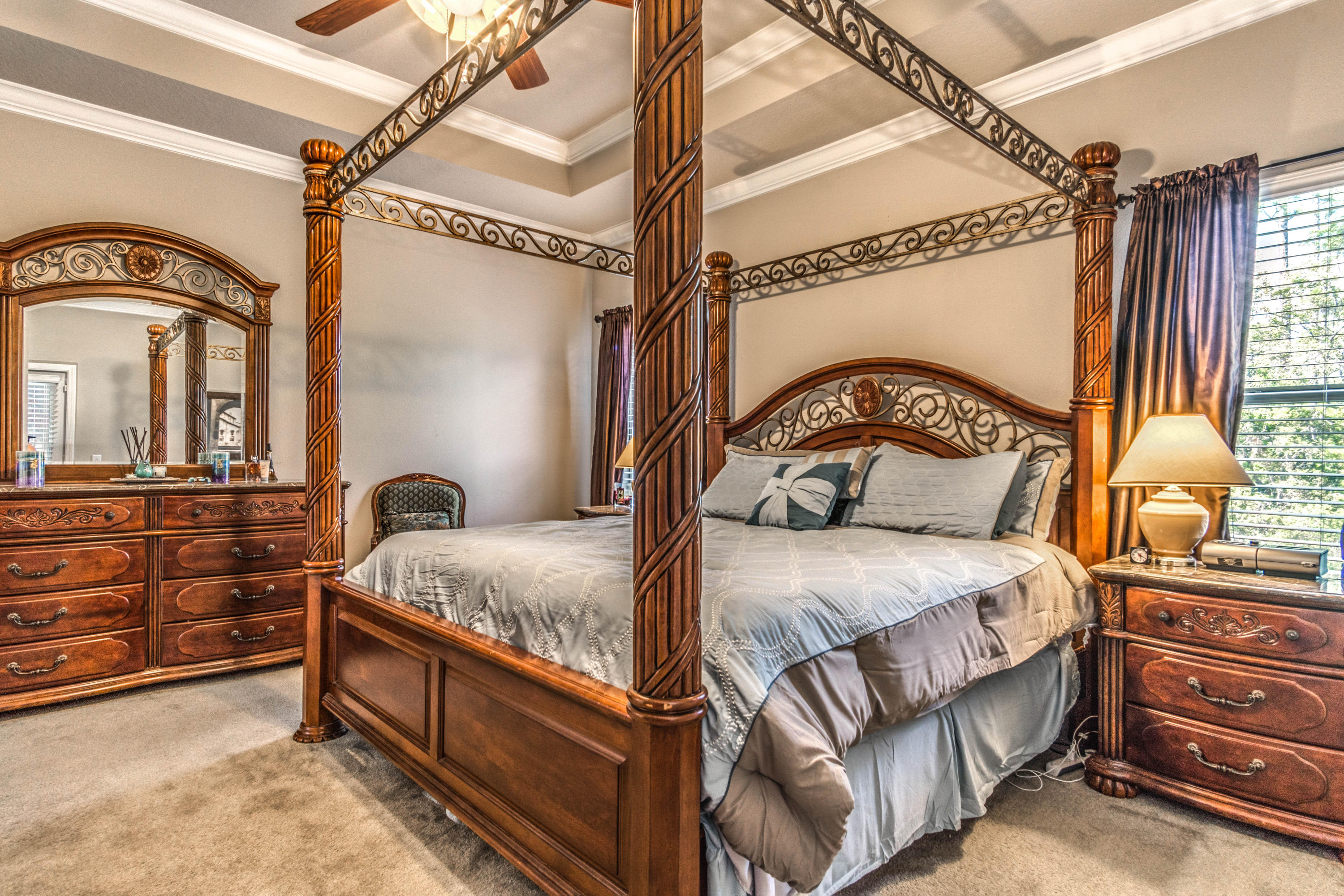 604 Red Fern Road Crestview, FL 32536 - Photo 22 of 36 a bedroom with a bed a dresser and window