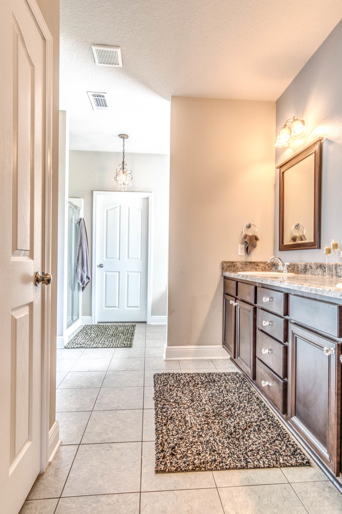 604 Red Fern Road Crestview, FL 32536 - Photo 24 of 36 a bathroom with a sink and a mirror