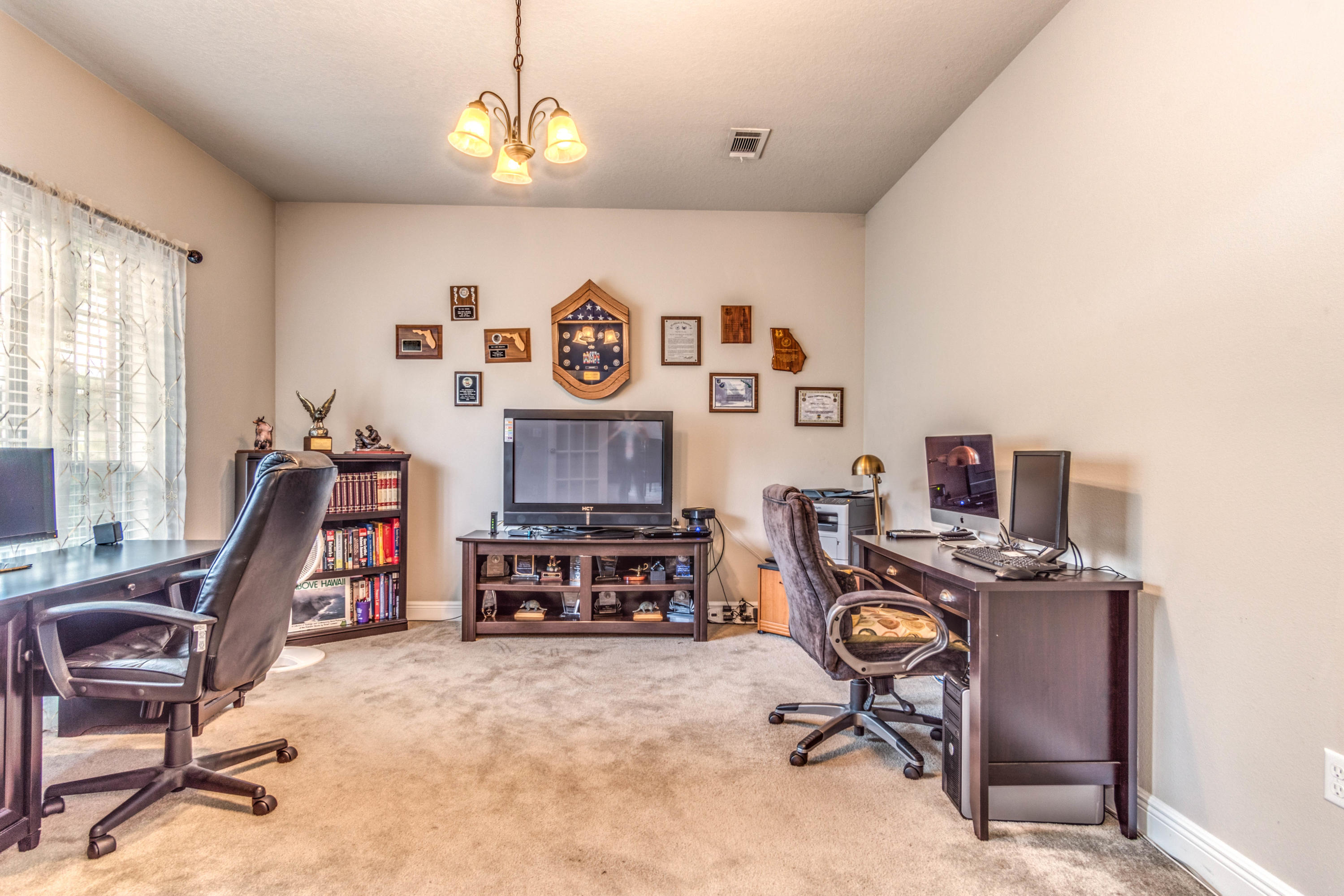 604 Red Fern Road Crestview, FL 32536 - Photo 28 of 36 a view of a workspace with furniture