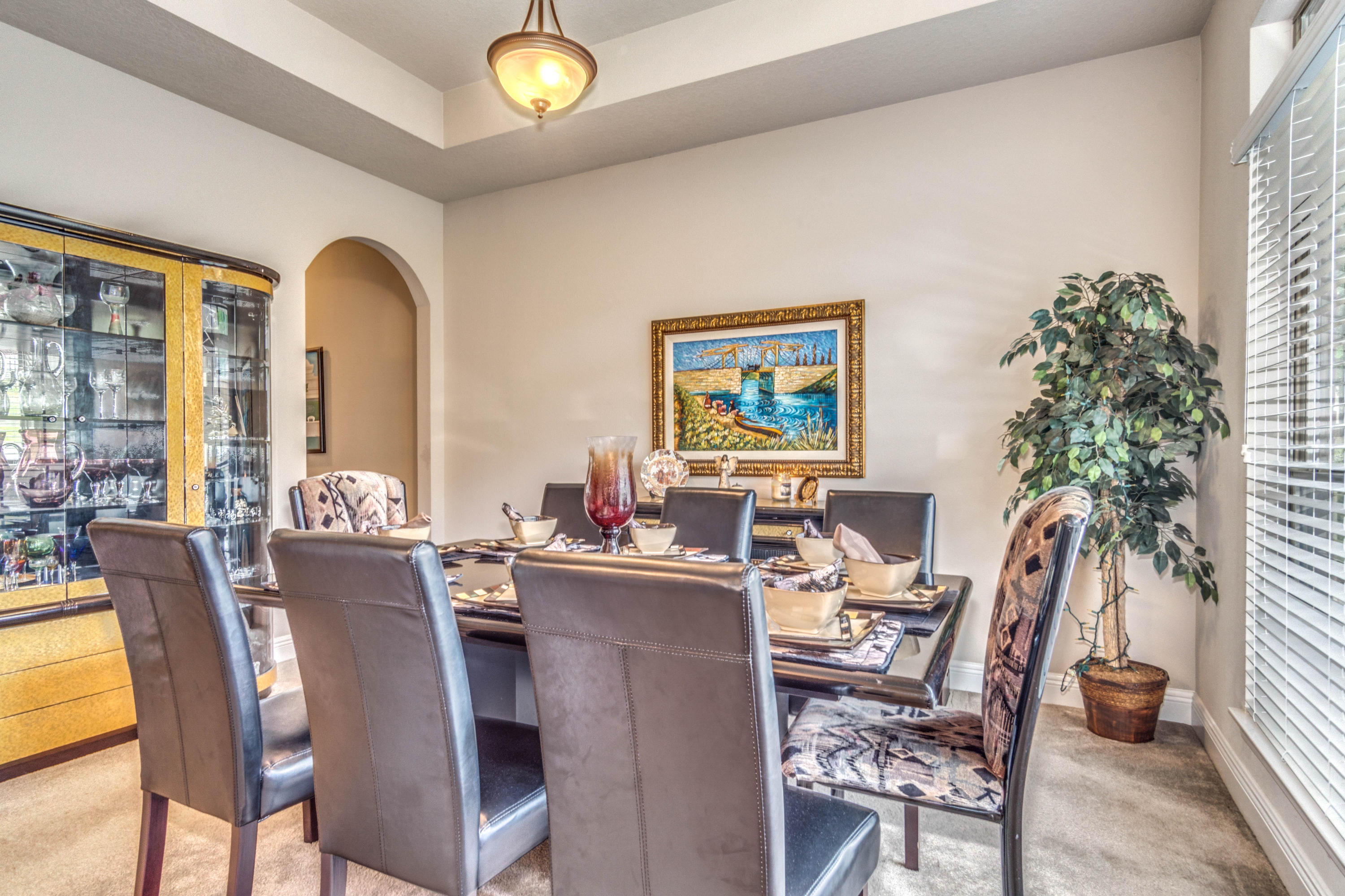 604 Red Fern Road Crestview, FL 32536 - Photo 3 of 36 a view of a dining room with furniture and a potted plant