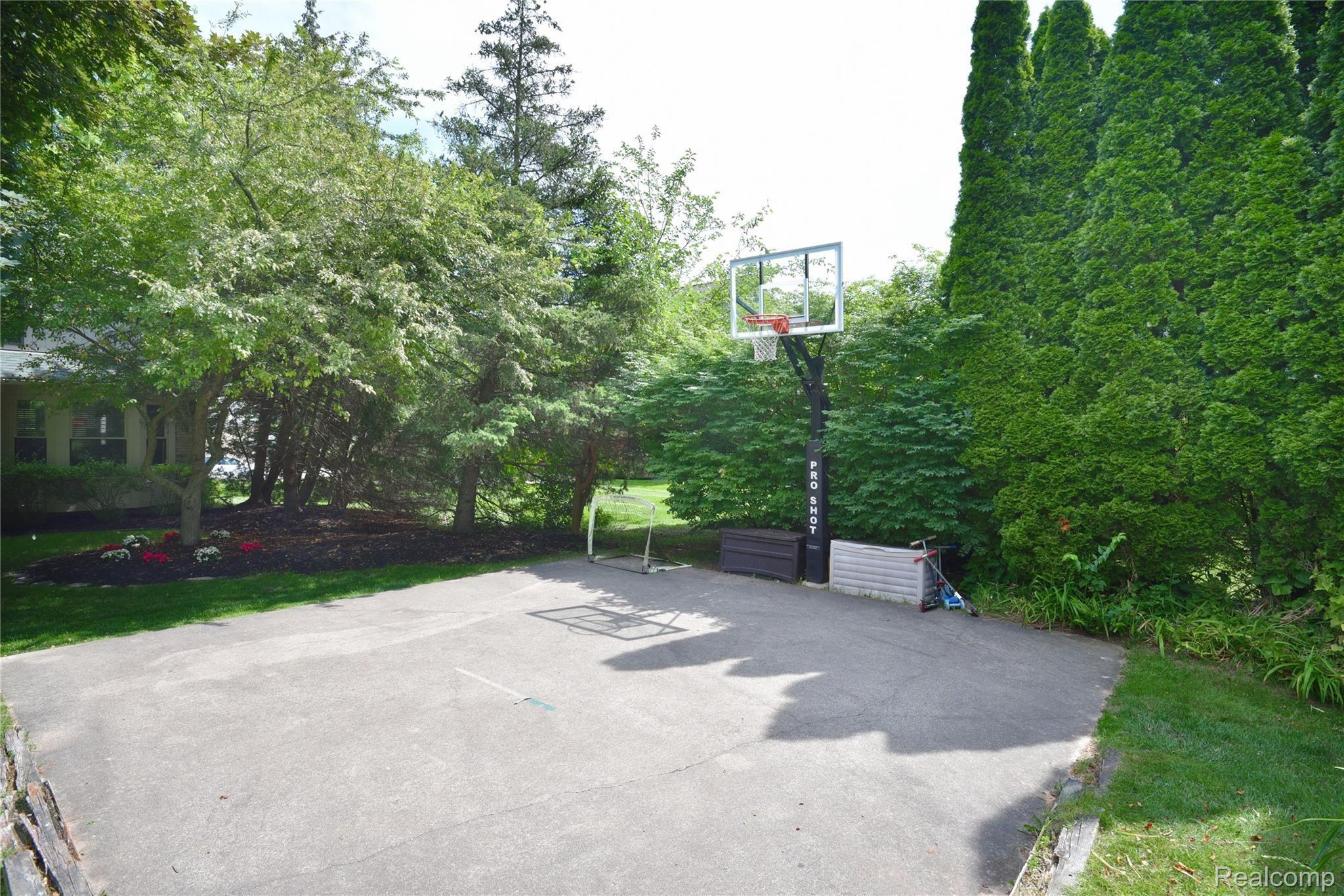 1069 Springwood Lane Rochester, MI 48309 - Photo 35 of 37 Fun "Sport Court" in backyard