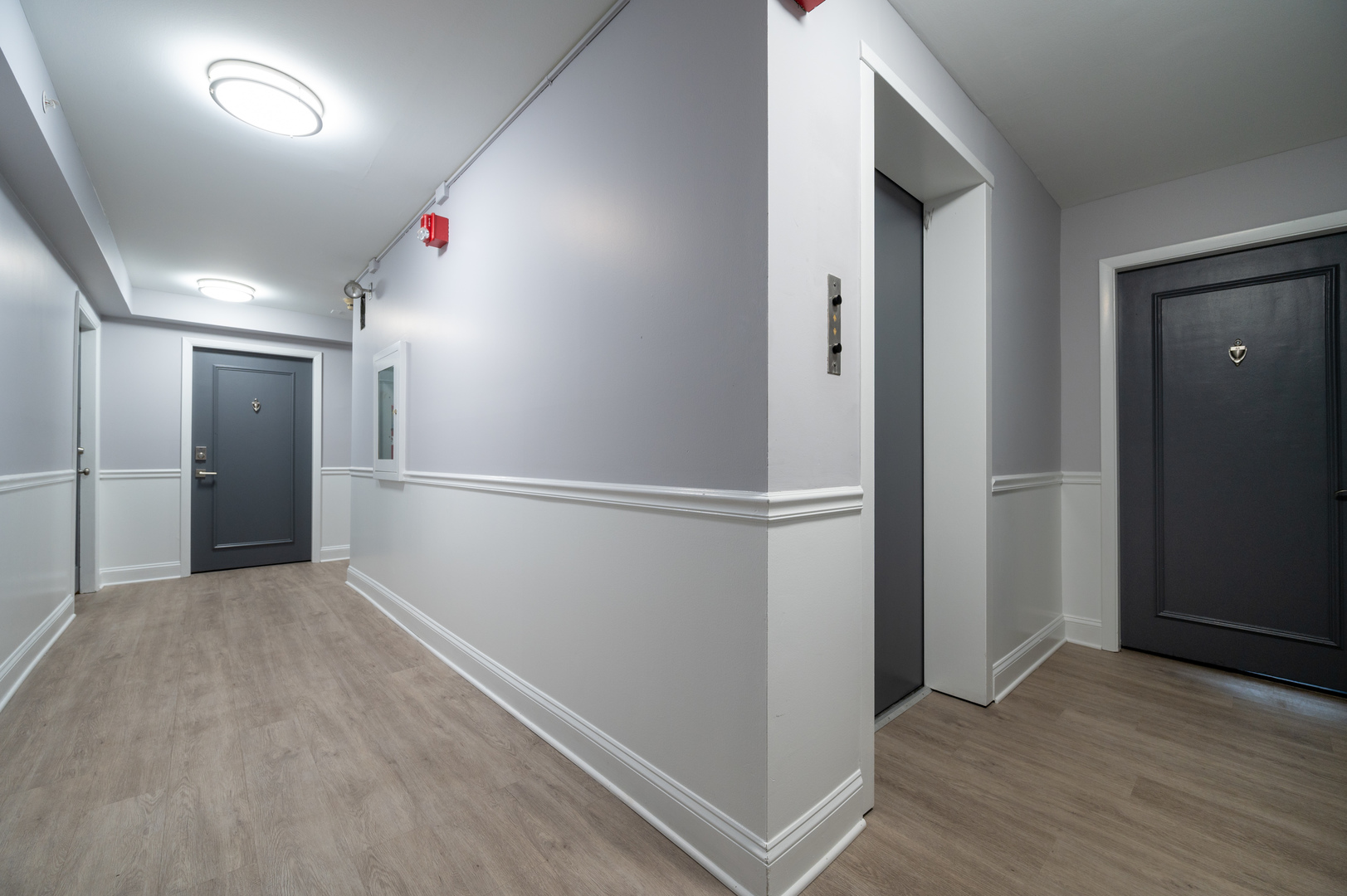 1 North Chestnut Avenue, Unit 2D Arlington Heights, IL 60005 - Photo 14 of 14 an empty room with wooden floor