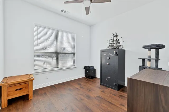 a room with furniture and a window