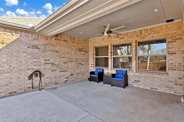 a view of a backyard of the house