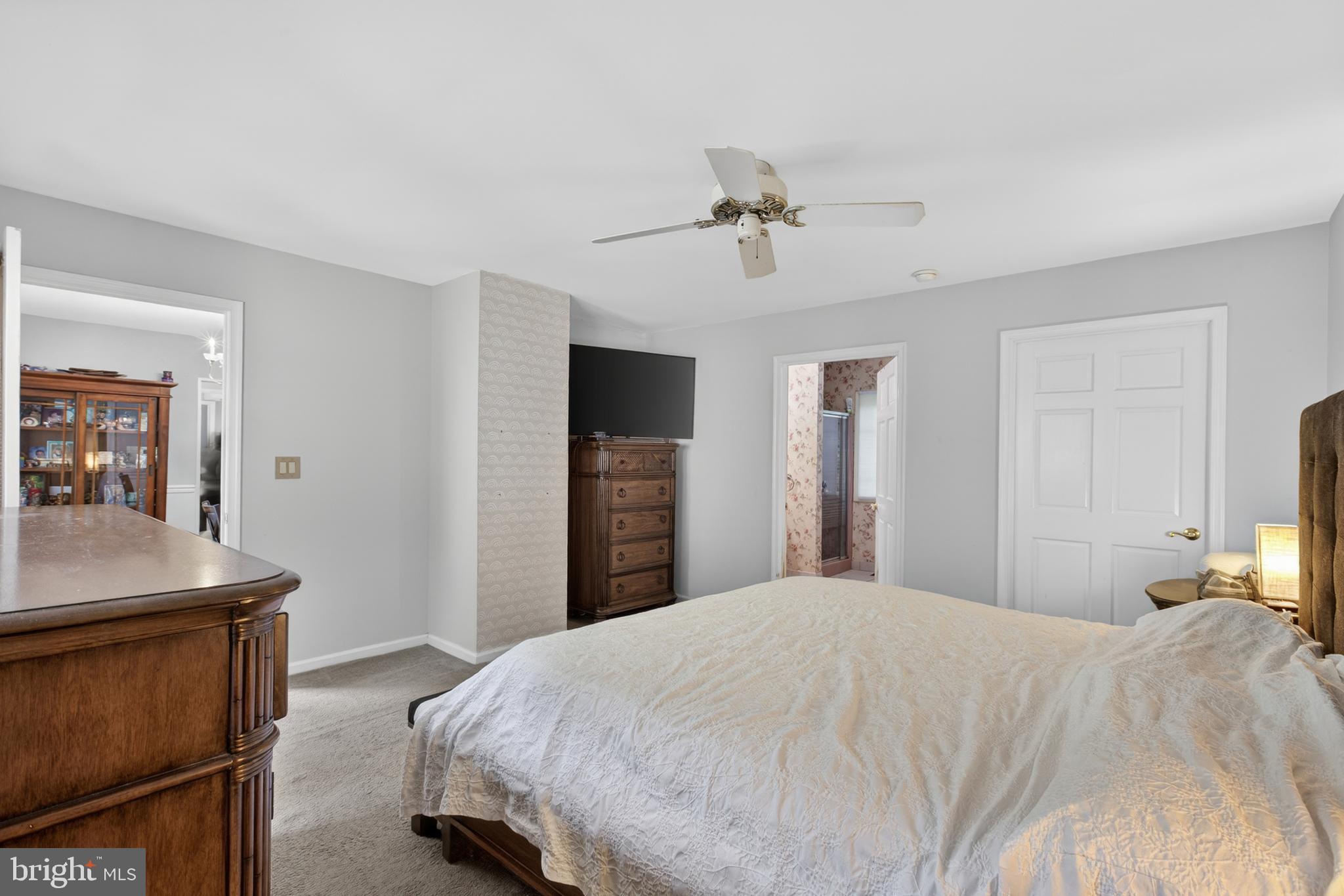 216 Revere Road Marlton, NJ 08053 - Photo 29 of 47 a bedroom with a bed and a sink