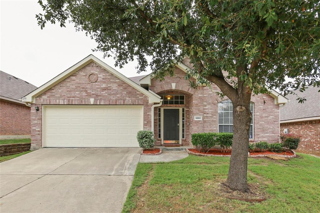 5961 Cheyenne Way Frisco, TX 75034 - Photo 1 of 33 Brick exterior with a gabled roofline and an arched entryway
