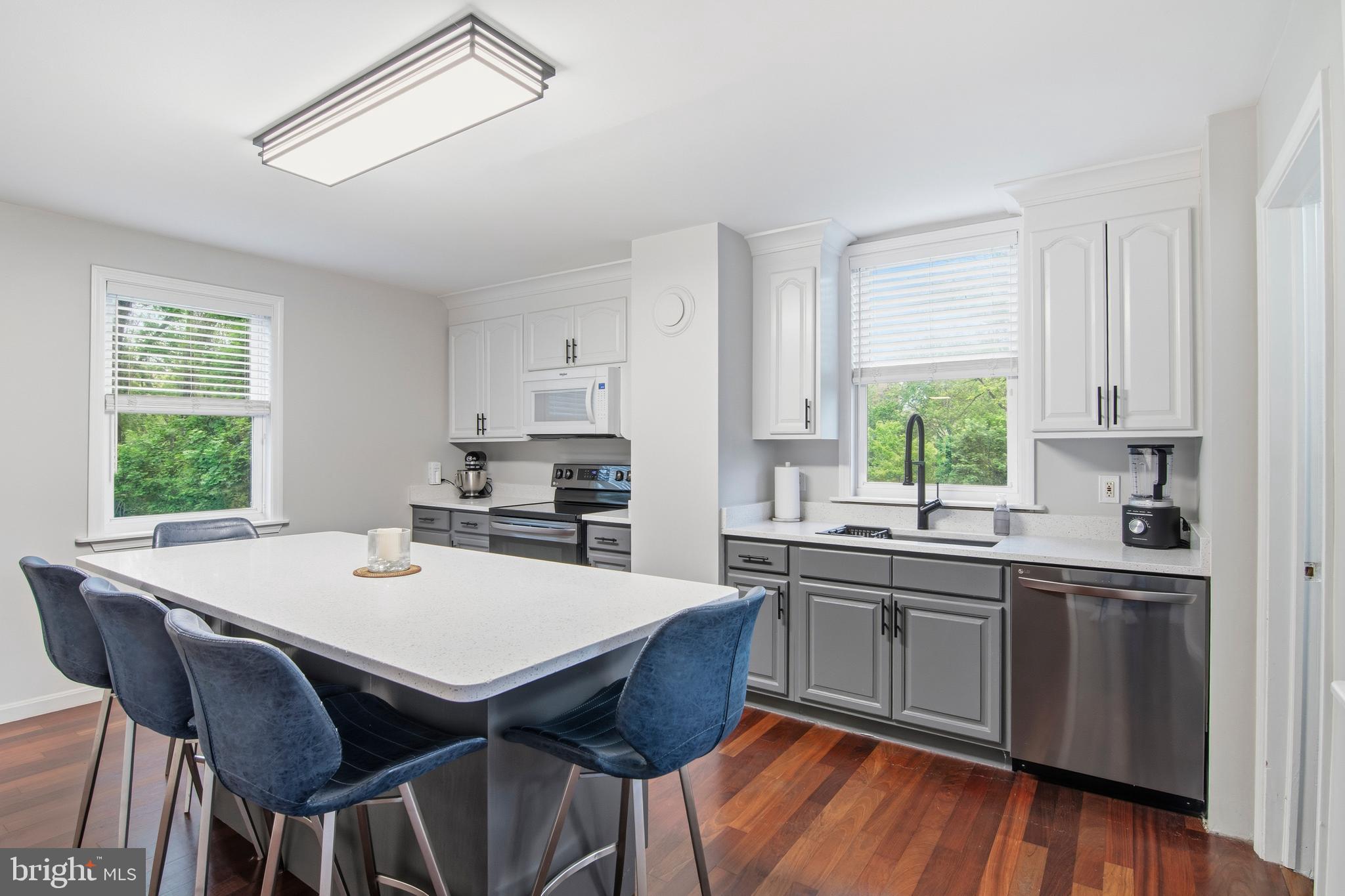 18708 York Road Parkton, MD 21120 - Photo 40 of 59 a kitchen with a dining table chairs and window