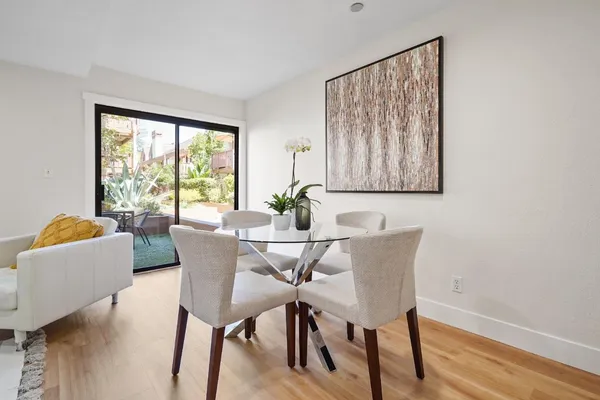 a view of a dining room with furniture window and outside view