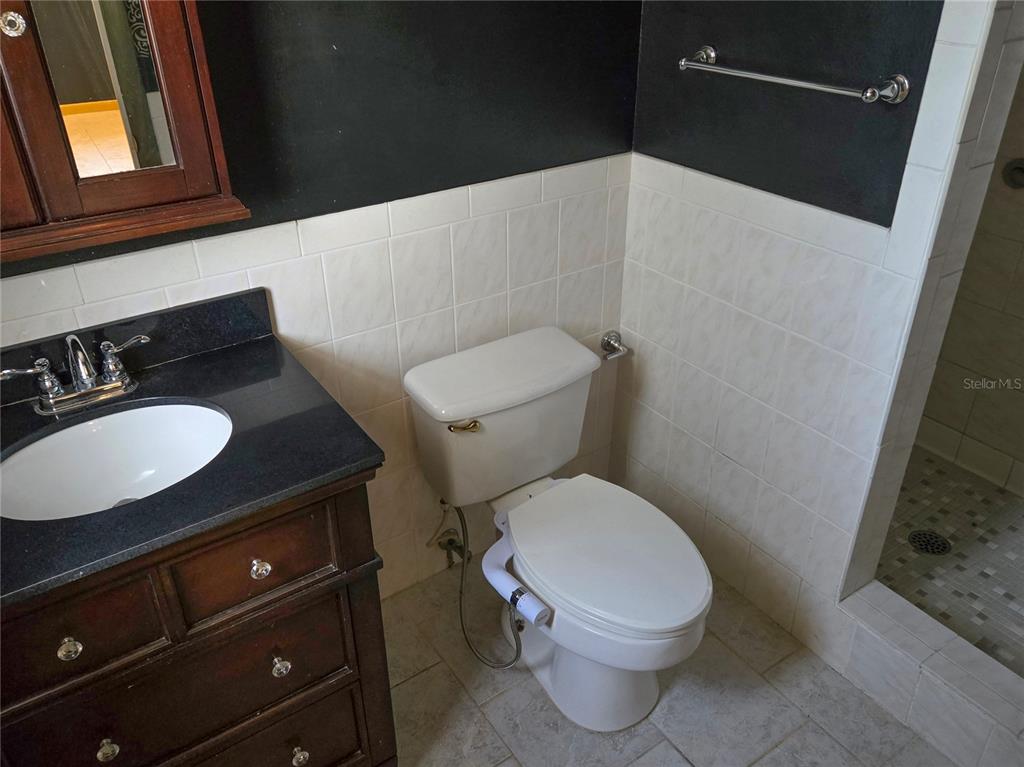 19 Spring Dr Place Ocala, FL 34472 - Photo 23 of 29 a bathroom with a sink and a toilet