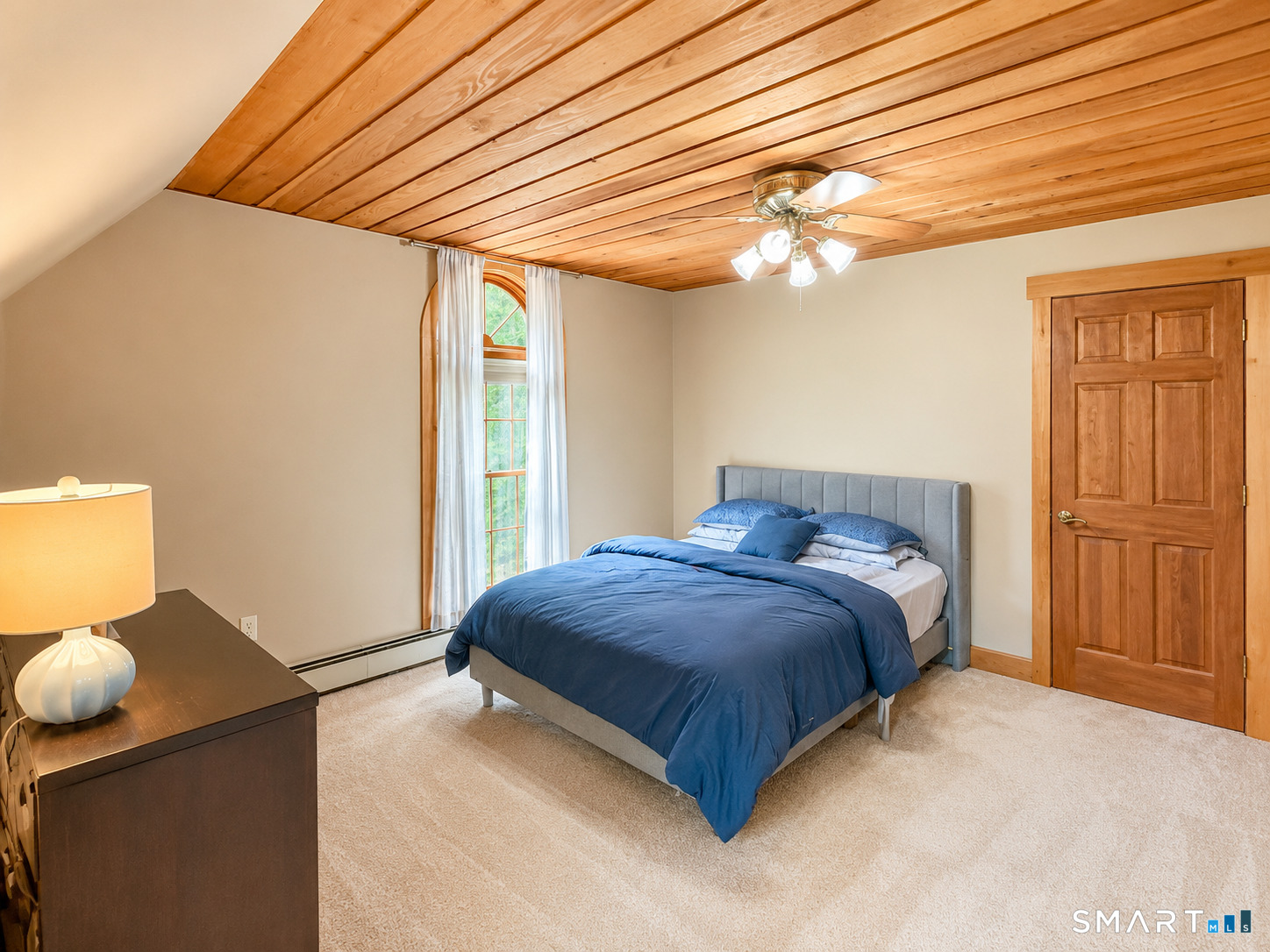 44 Pine Road Colebrook, CT 06021 - Photo 22 of 40 a bedroom with a bed and chandelier