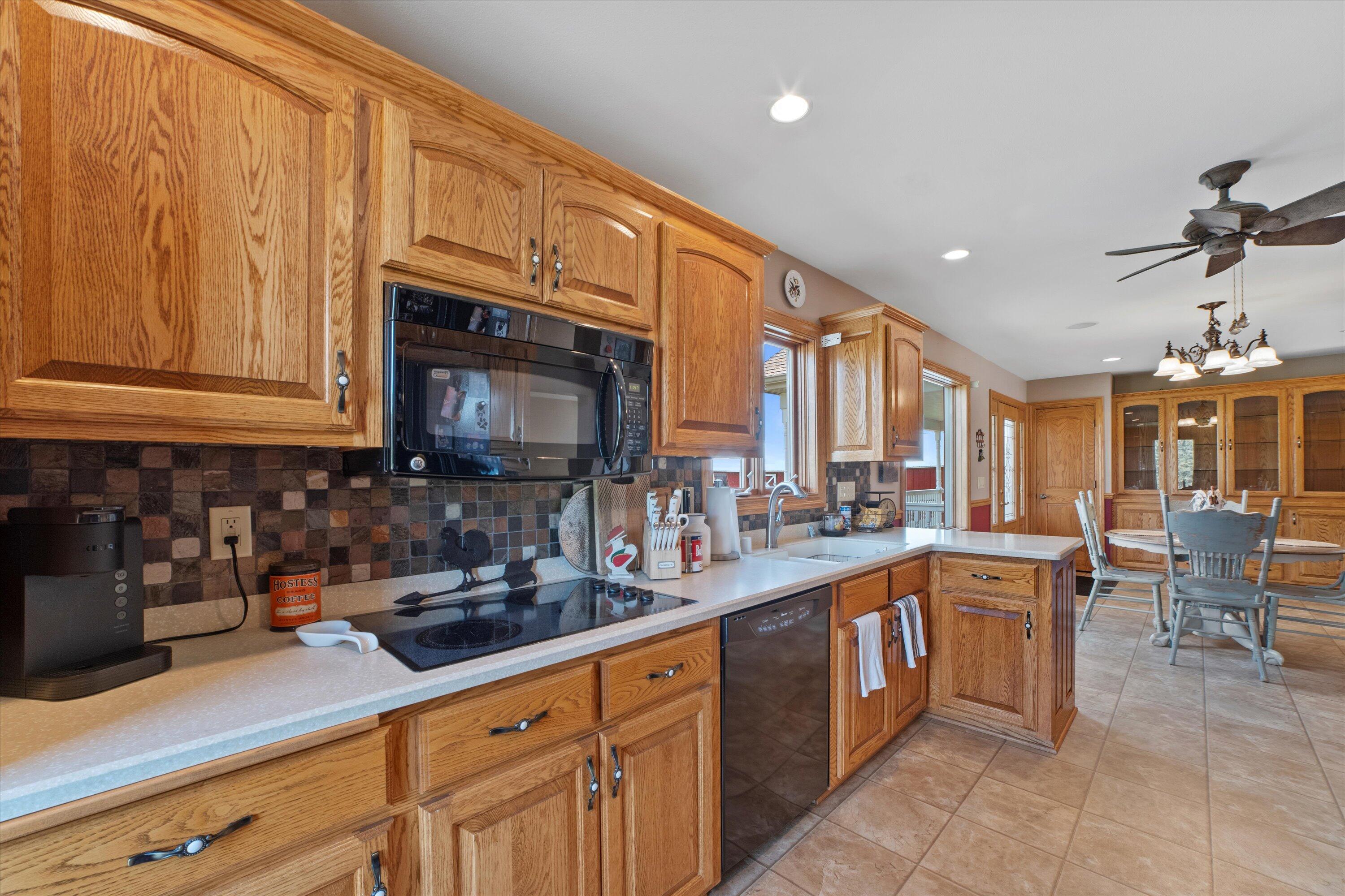 N4554 Lakeview Road Hustisford, WI 53034 - Photo 29 of 38 Loads of cabinets in kitchen