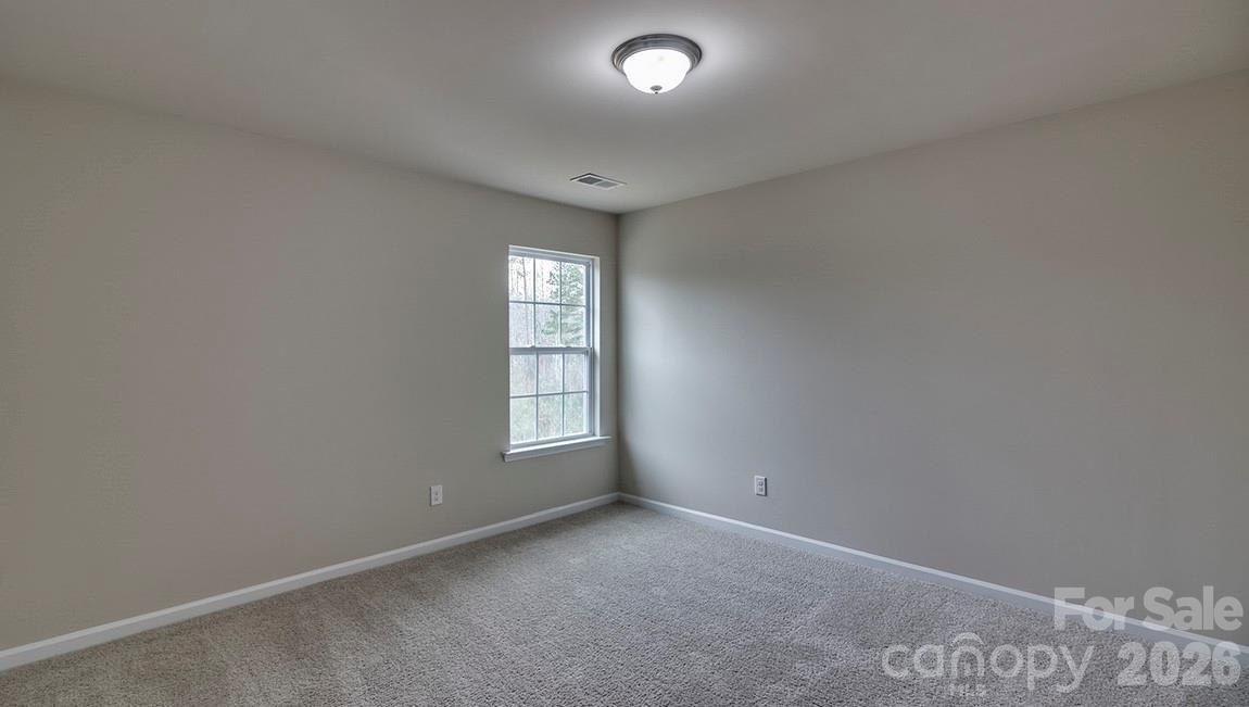 109 Piney Wds Road Fletcher, NC 28732 - Photo 17 of 28 an empty room with windows