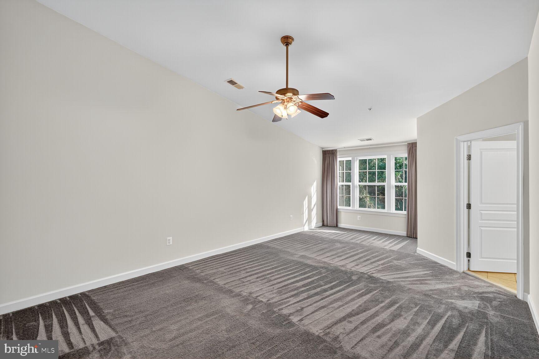 1755 Chiswick Court Silver Spring, MD 20904 - Photo 11 of 34 a view of an empty room with a window