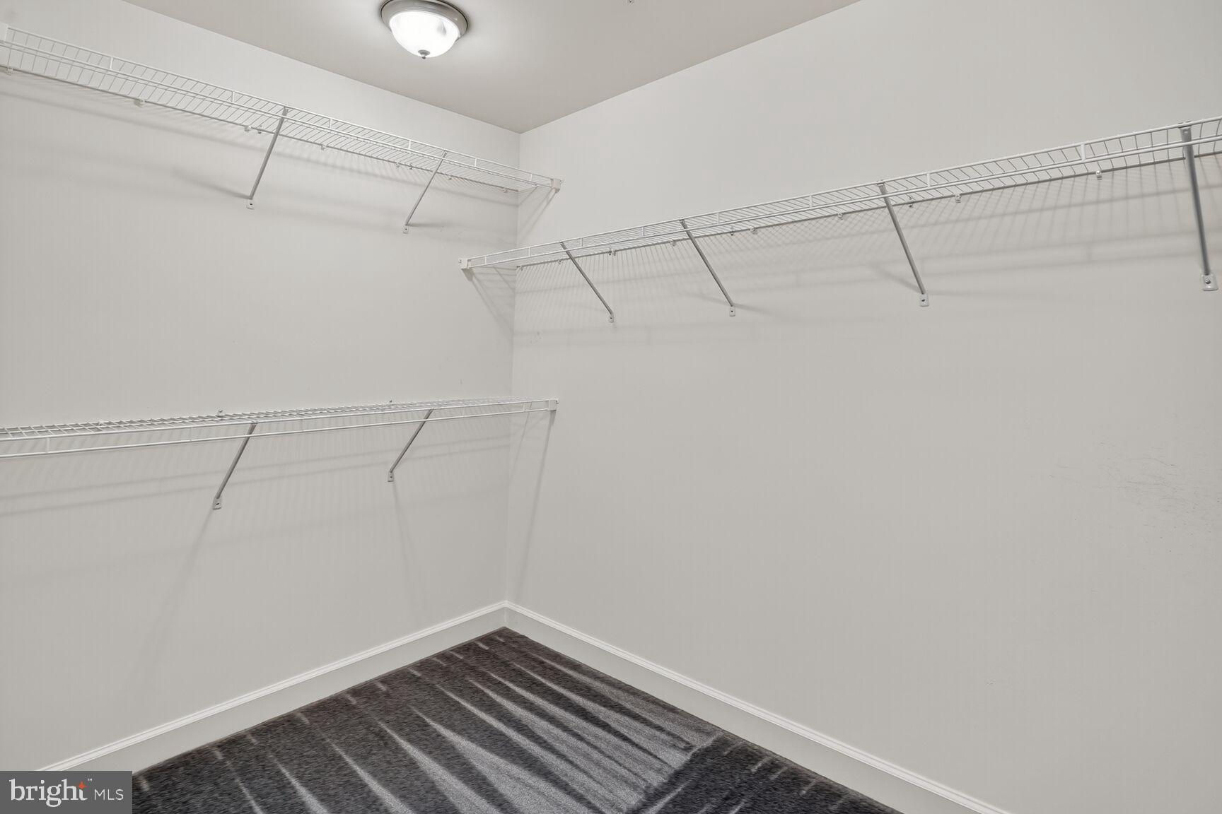 1755 Chiswick Court Silver Spring, MD 20904 - Photo 14 of 34 a view of a room with racks on the wall