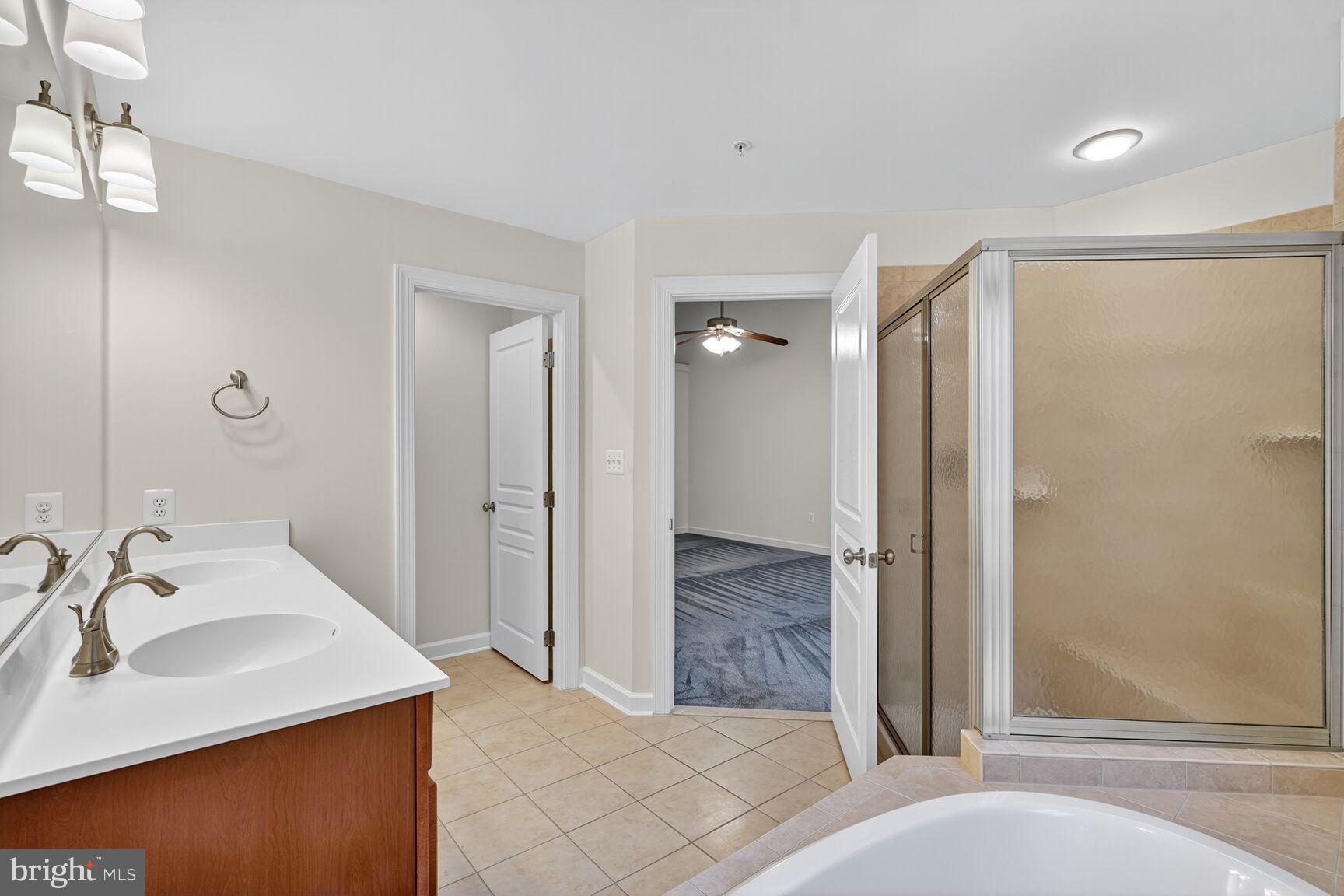 1755 Chiswick Court Silver Spring, MD 20904 - Photo 17 of 34 a bathroom with a sink and a mirror