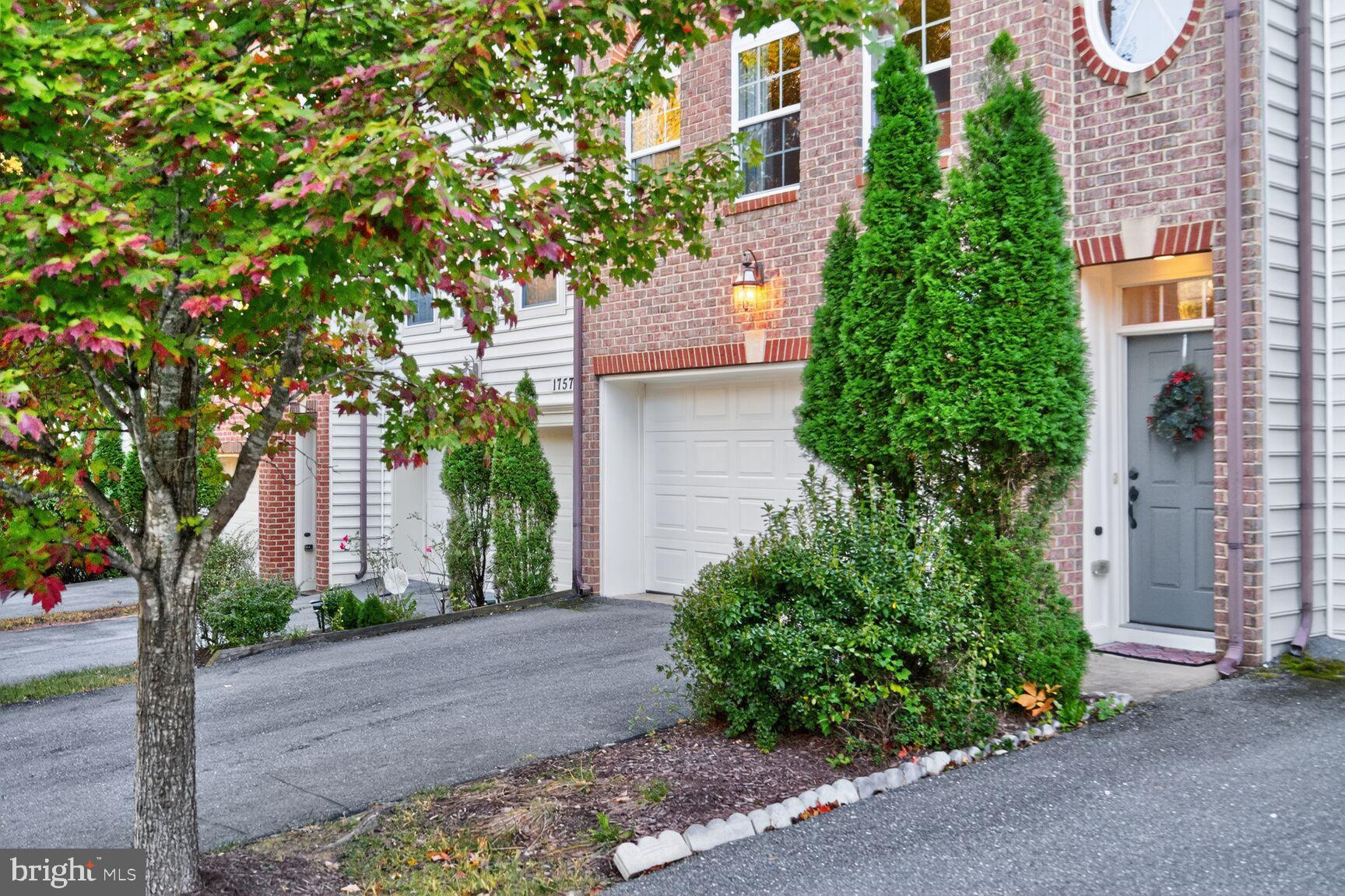 1755 Chiswick Court Silver Spring, MD 20904 - Photo 2 of 34 a front view of a house with garden