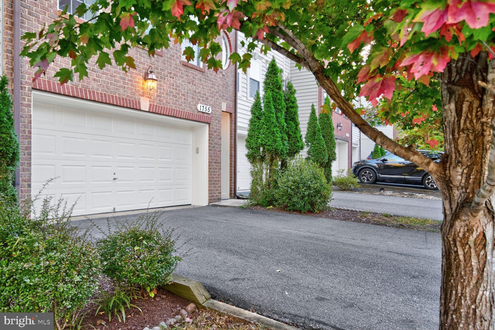 1755 Chiswick Court Silver Spring, MD 20904 - Photo 3 of 34 a house with a tree in front of it