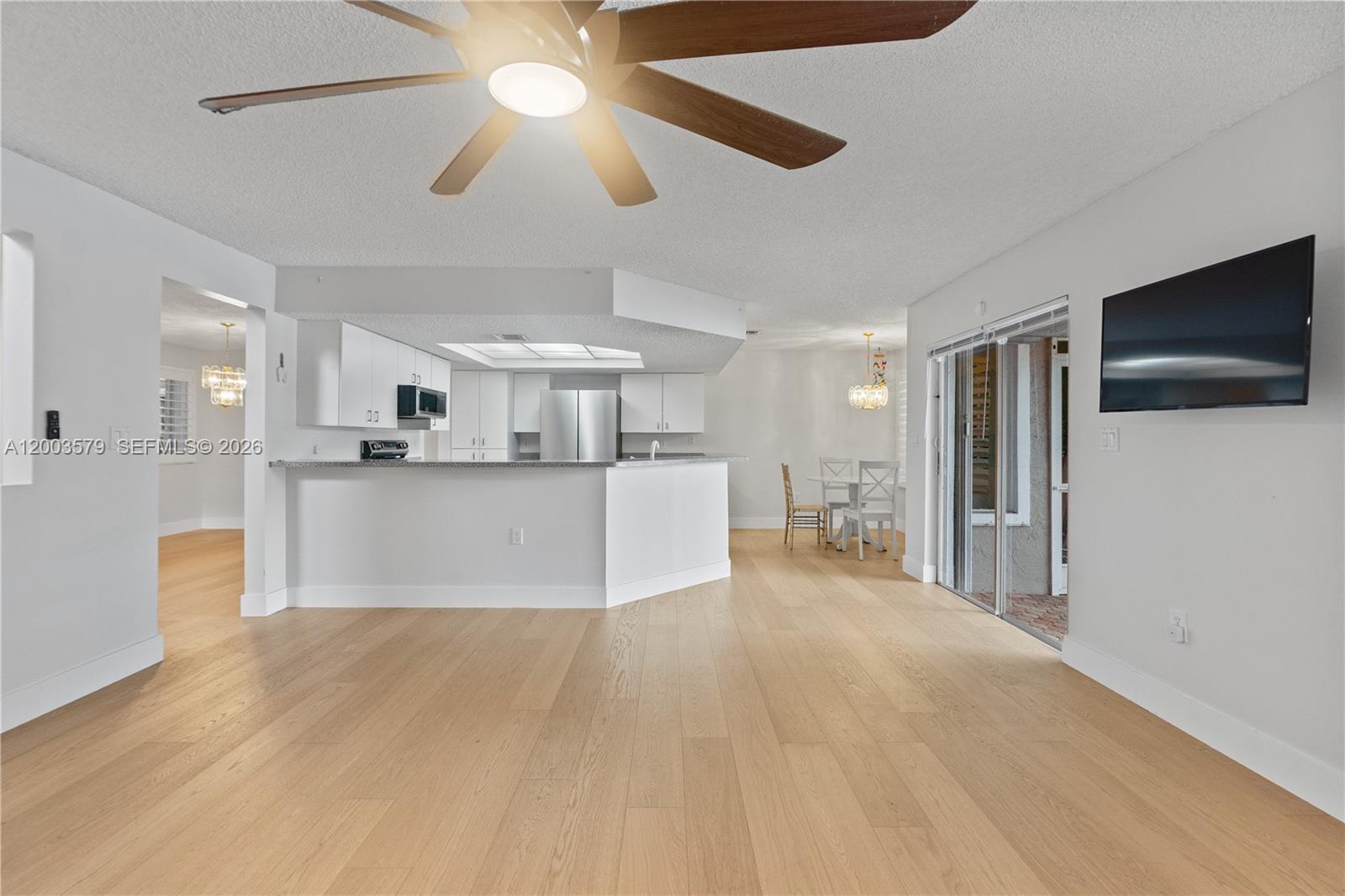 237 Northwest 100th Avenue Plantation, FL 33324 - Photo 22 of 86 a view of an empty room and kitchen view