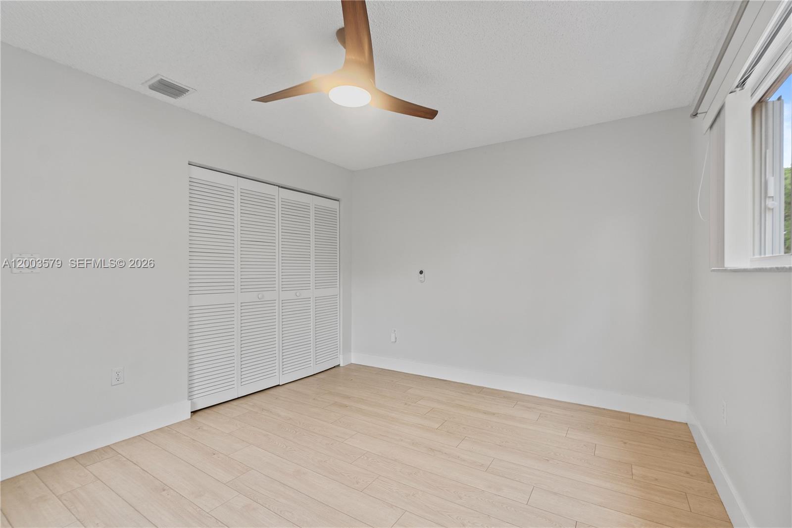 237 Northwest 100th Avenue Plantation, FL 33324 - Photo 40 of 86 an empty room with a empty space and a window