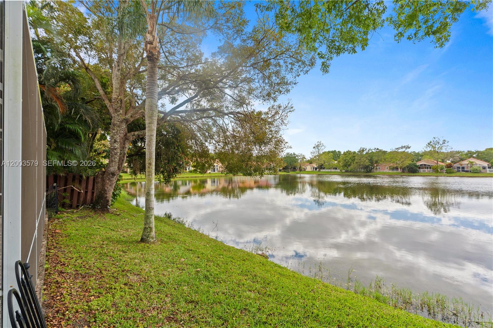 237 Northwest 100th Avenue Plantation, FL 33324 - Photo 42 of 86 a backyard of a house with lots of green space