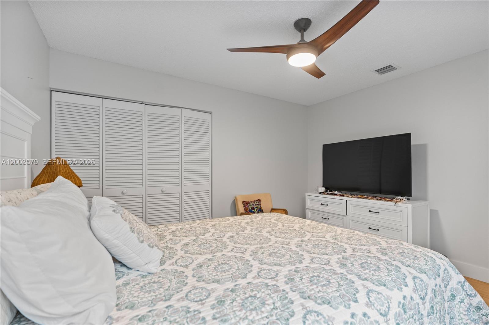 237 Northwest 100th Avenue Plantation, FL 33324 - Photo 43 of 86 a bedroom with a bed and a flat screen tv