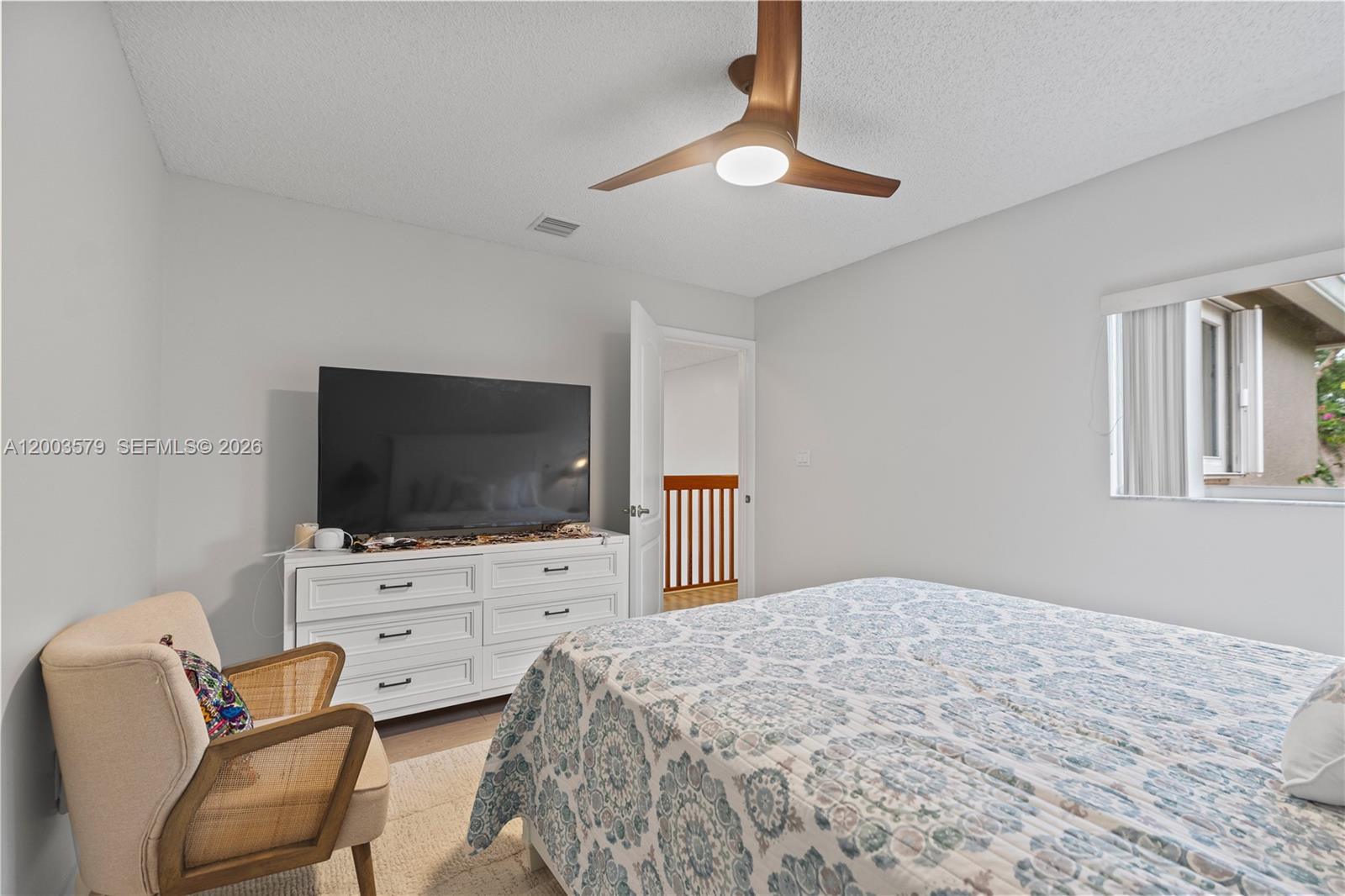237 Northwest 100th Avenue Plantation, FL 33324 - Photo 46 of 86 a bedroom with a bed and a flat screen tv