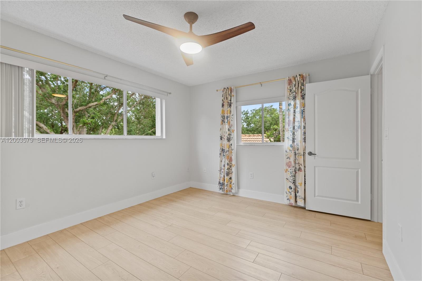 237 Northwest 100th Avenue Plantation, FL 33324 - Photo 52 of 86 an empty room with windows and closet